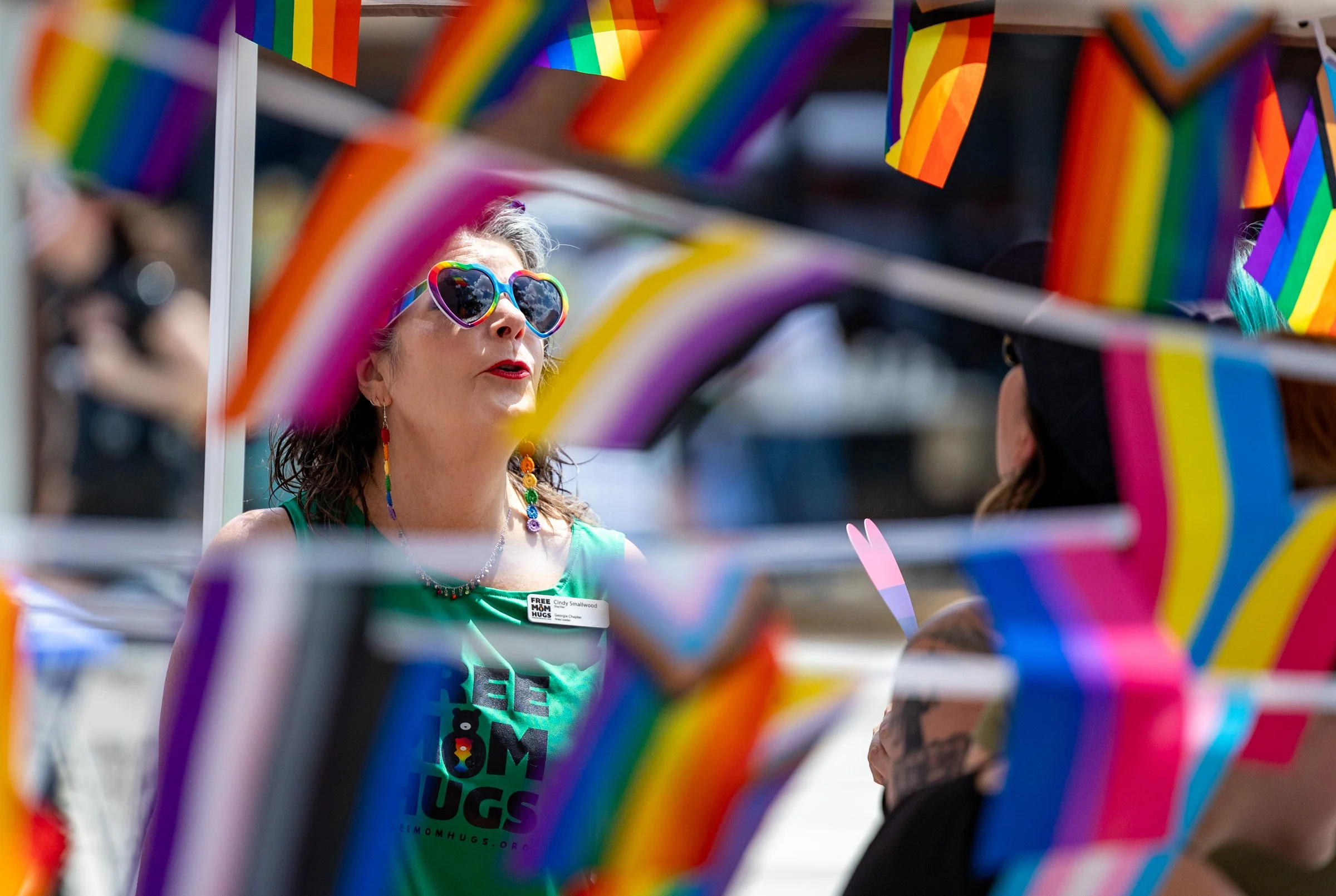 Mary Biggins speaks with a vendor during Pridefest, hosted by Athens Pride & Queer Collective, in downtown Athens, Georgia, on Saturday, June 6, 2026. In addition to the parade, Pridefest features live music and performances, vendors and a kid zone. 