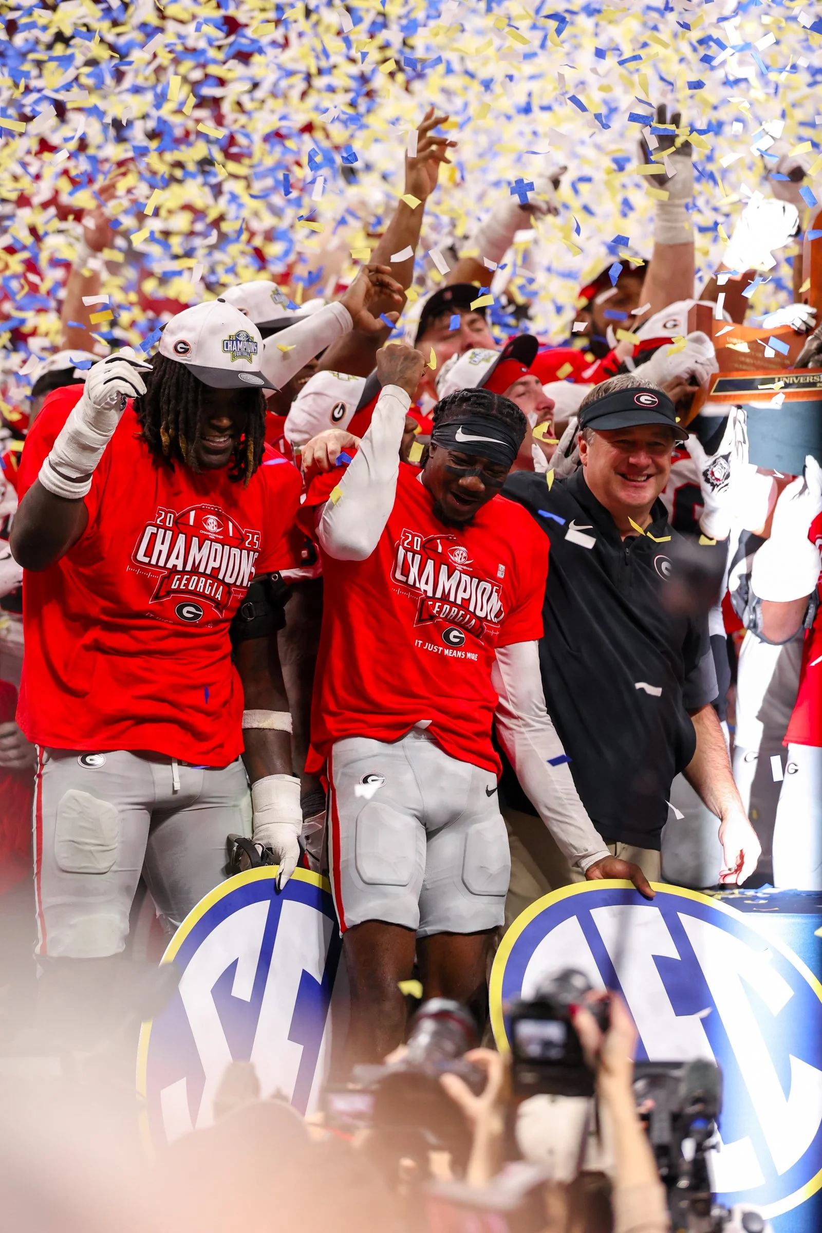 Georgia head coach Kirby Smart celebrates with his team after Georgia wins the SEC Championship game between Georgia and Alabama at Mercedes-Benz Stadium in Atlanta, Georgia, on Saturday, Dec. 6, 2025. Georgia won 28-7. (Photo/Kaleb Tatum)