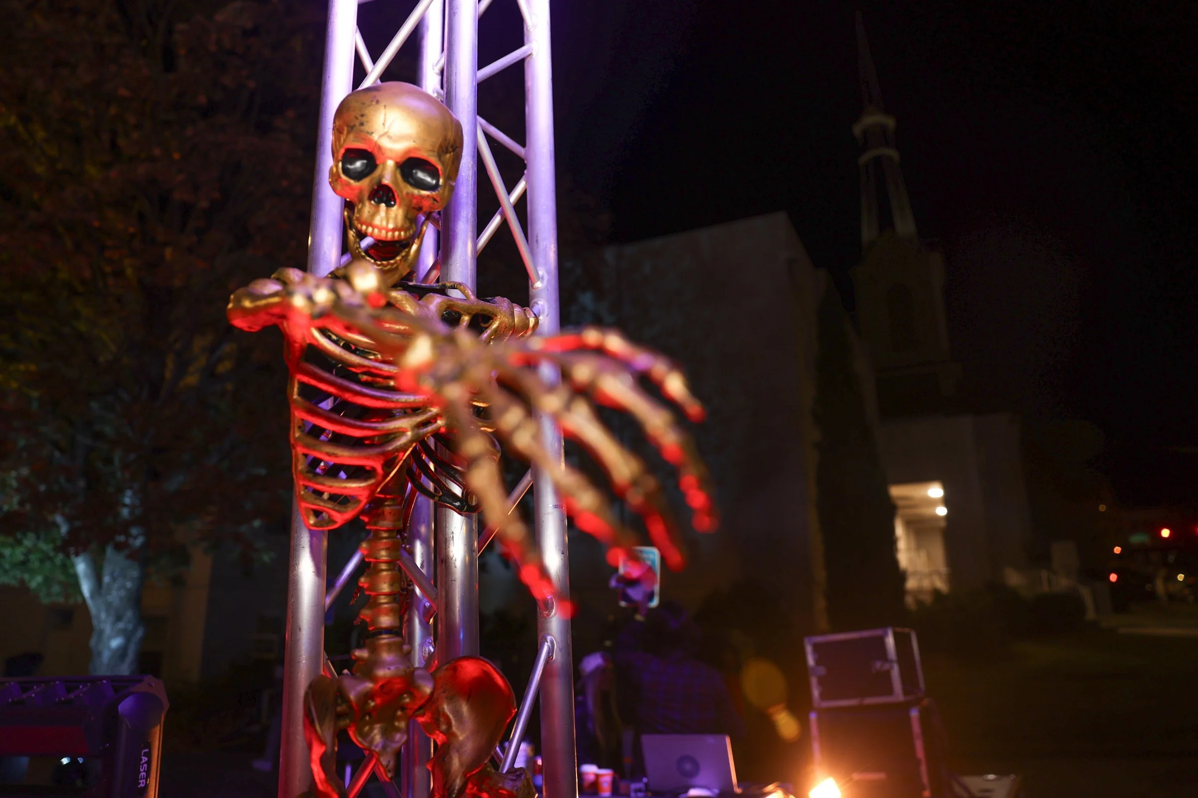 A skeleton decoration sits on a pole during the 17th Wild Rumpus Halloween Parade & Spectacle in downtown Athens, Georgia, or Saturday, Oct. 25, 2025. The night began with a parade that marched through downtown, followed by a night of music and enter