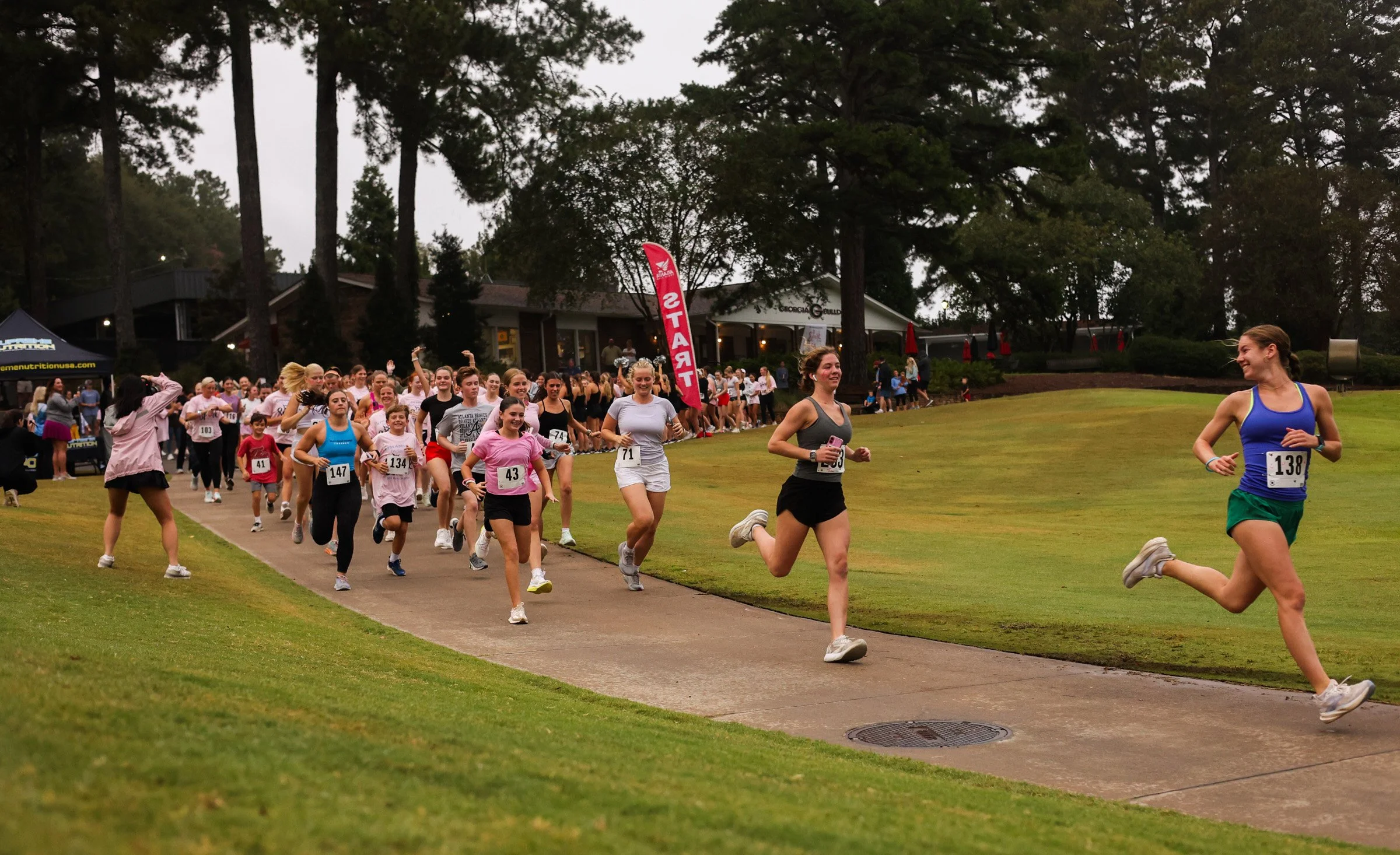 Attendees start the Tini Semeria 6th Annual Spark in the Dark 5K at the University of Georgia Golf Course in Athens, Georgia, on Oct. 5, 2025. The Spark in the Dark 5K run is an annual event that honors the memory of Christina Semeria, a University o