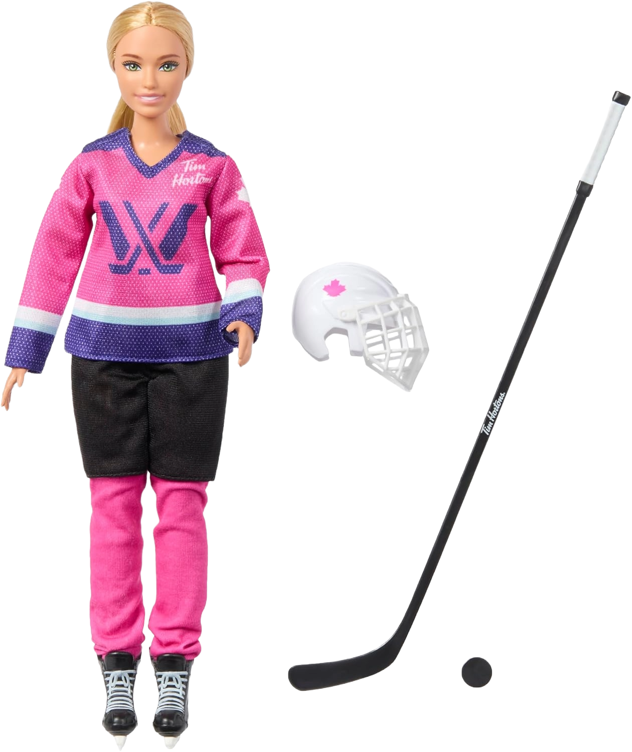 A Barbie doll dressed in a pink and purple hockey jersey, black shorts, pink pants, and ice skates. Next to her is a white hockey helmet with a pink maple leaf decal and a hockey stick with the Tim Hortons logo, black blade, and white handle.