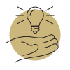 A hand holding a light bulb