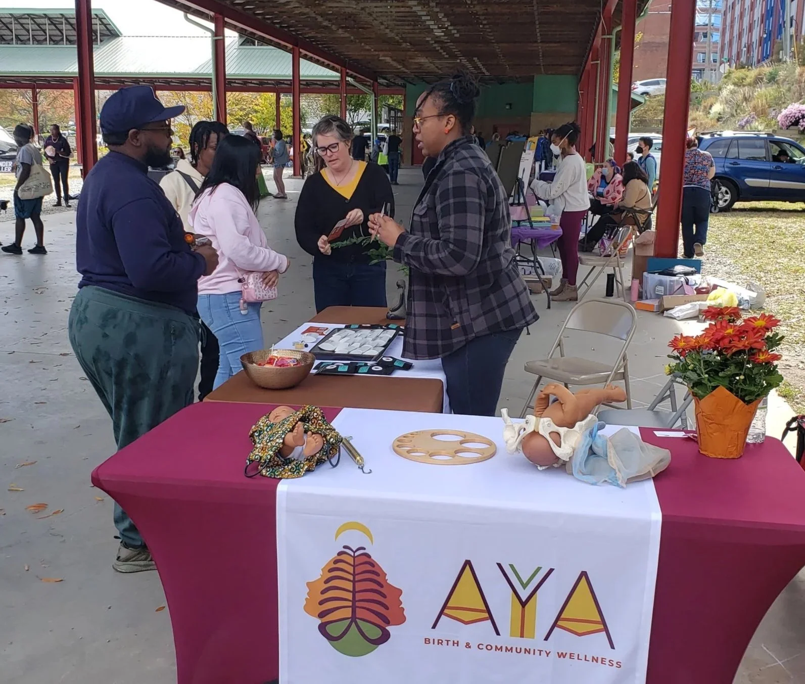 Aya table at community event