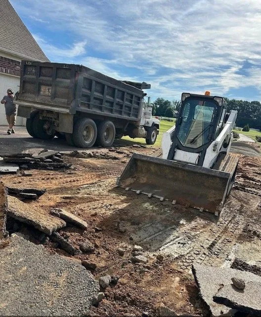 Skidsteer equipment for landscaping project in Bartlett Tennessee.