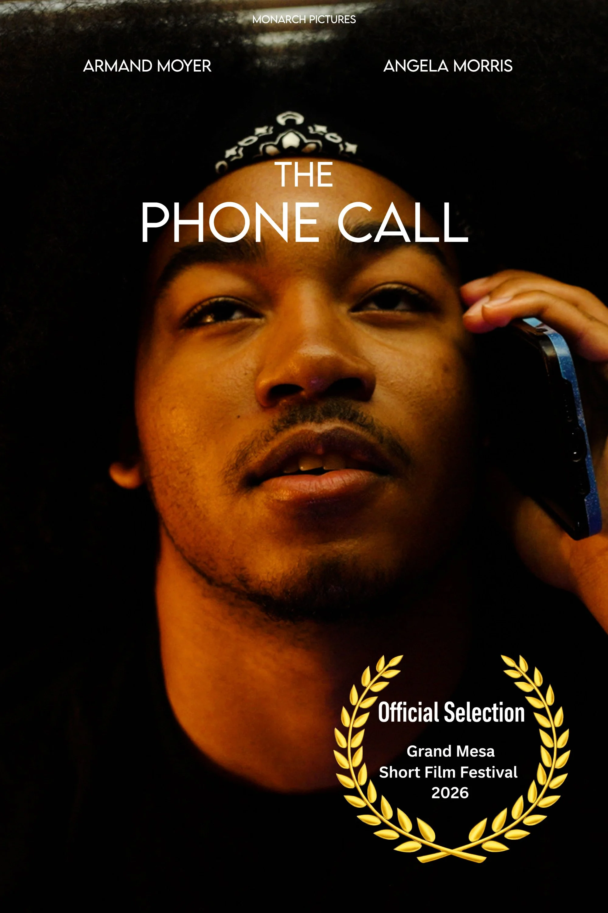 Close-up of a young man with a dark background, holding a phone to his ear, with text overlay indicating he is part of a film festival. The text mentions 'The Phone Call,' directed by Armand Moyer and Angela Morris, awarded at the 2026 Grand Mesa Sho
