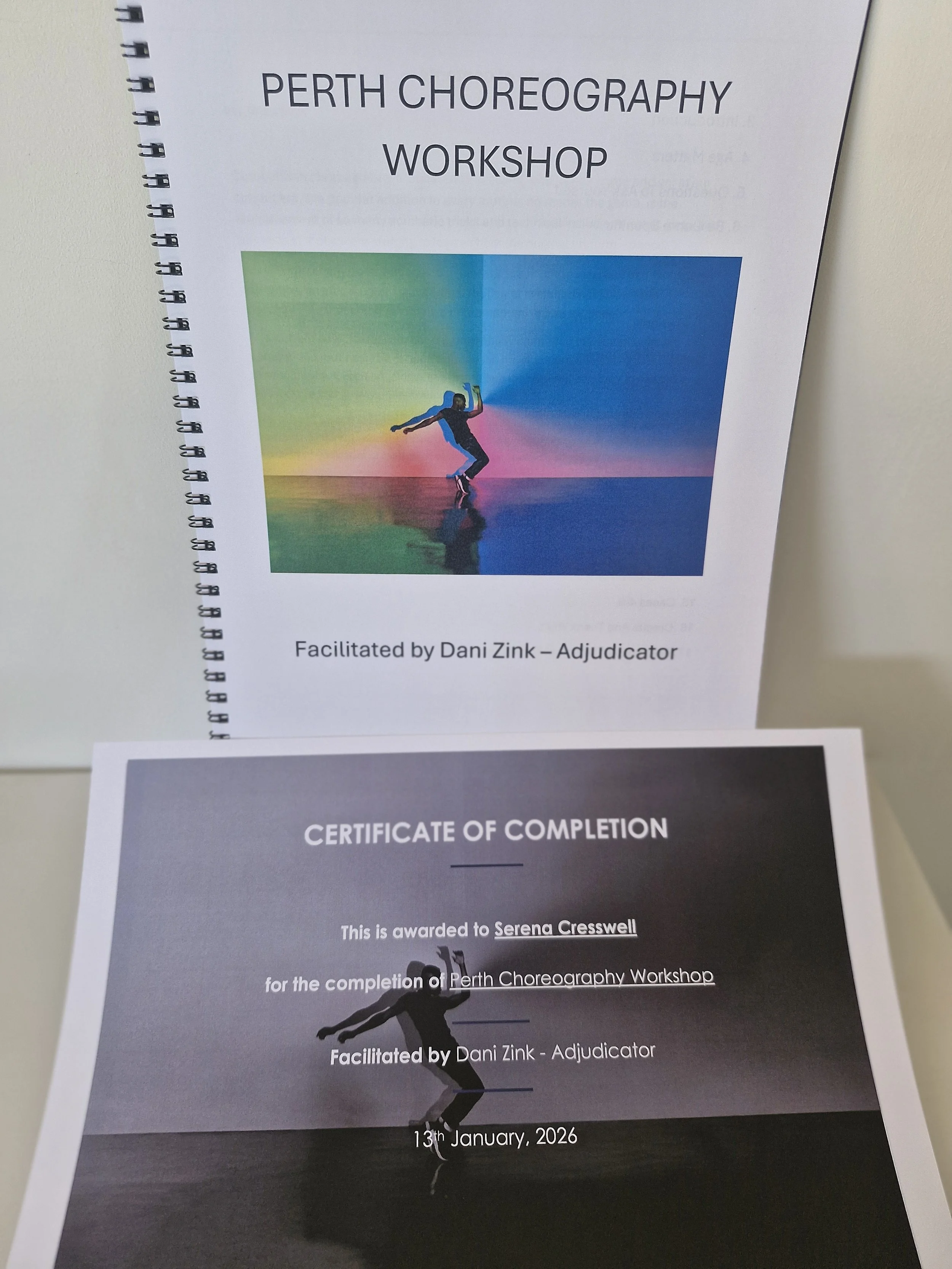Pictured: Above - provided workbook. Below - Certificate of Completion