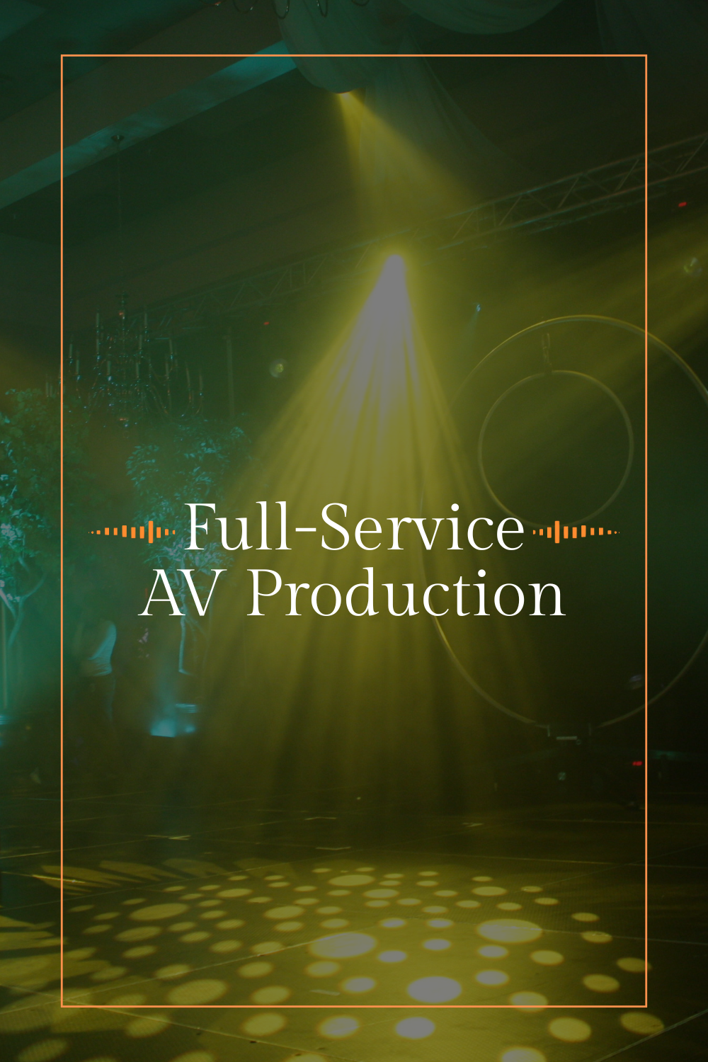 Stage with colorful spotlights and a chandelier, promoting full-service AV production for events.