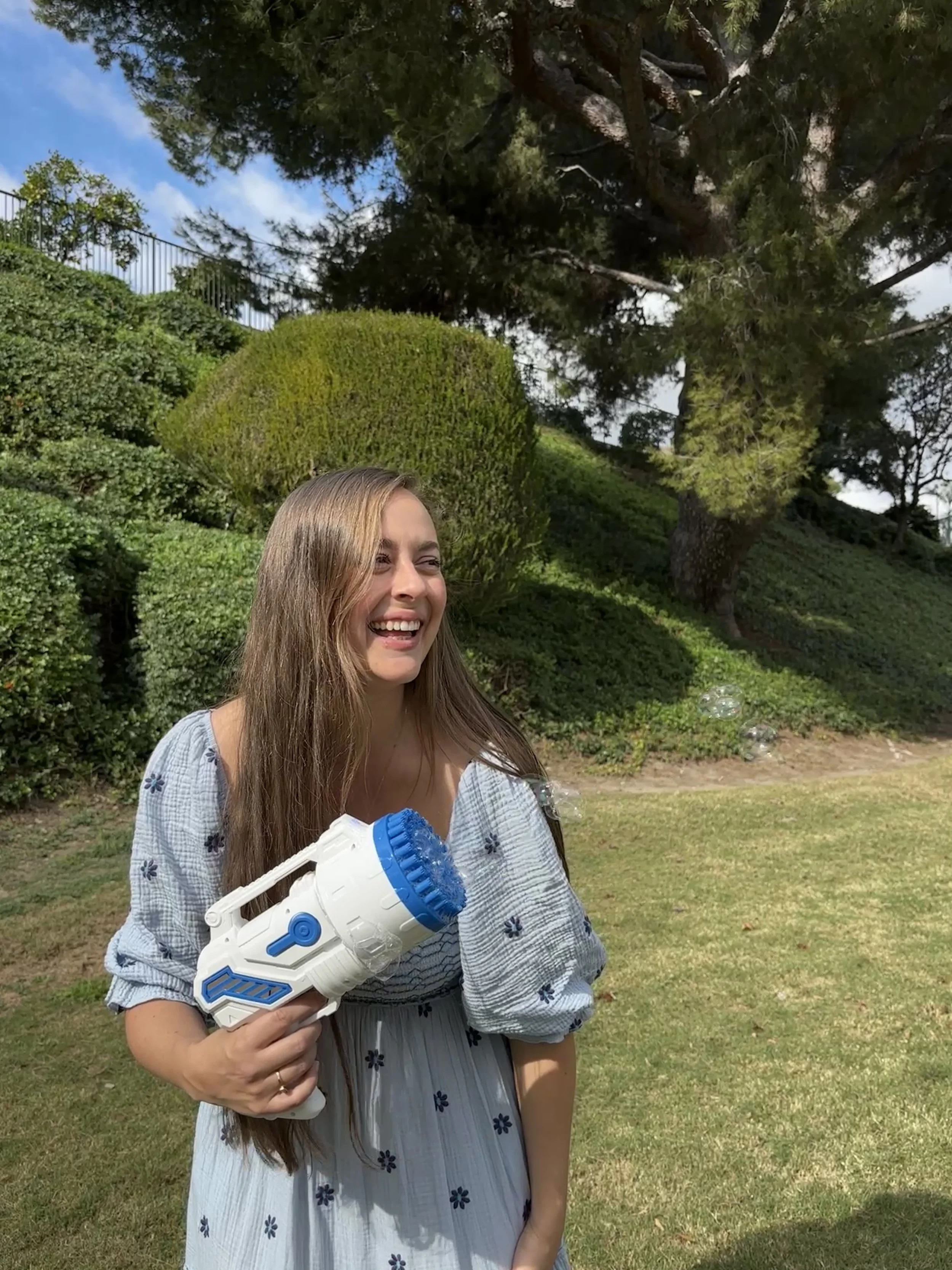 Bubble station rental with bubble gun at a family gathering in South Orange County.