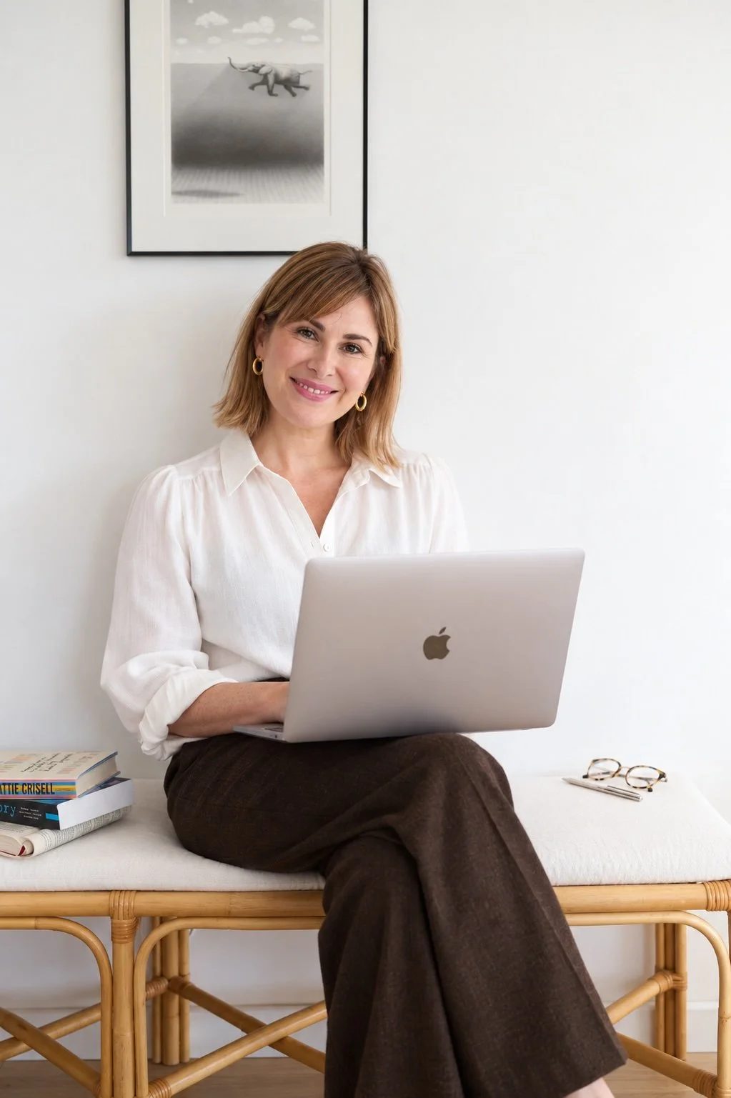 Carly Morris working on a laptop