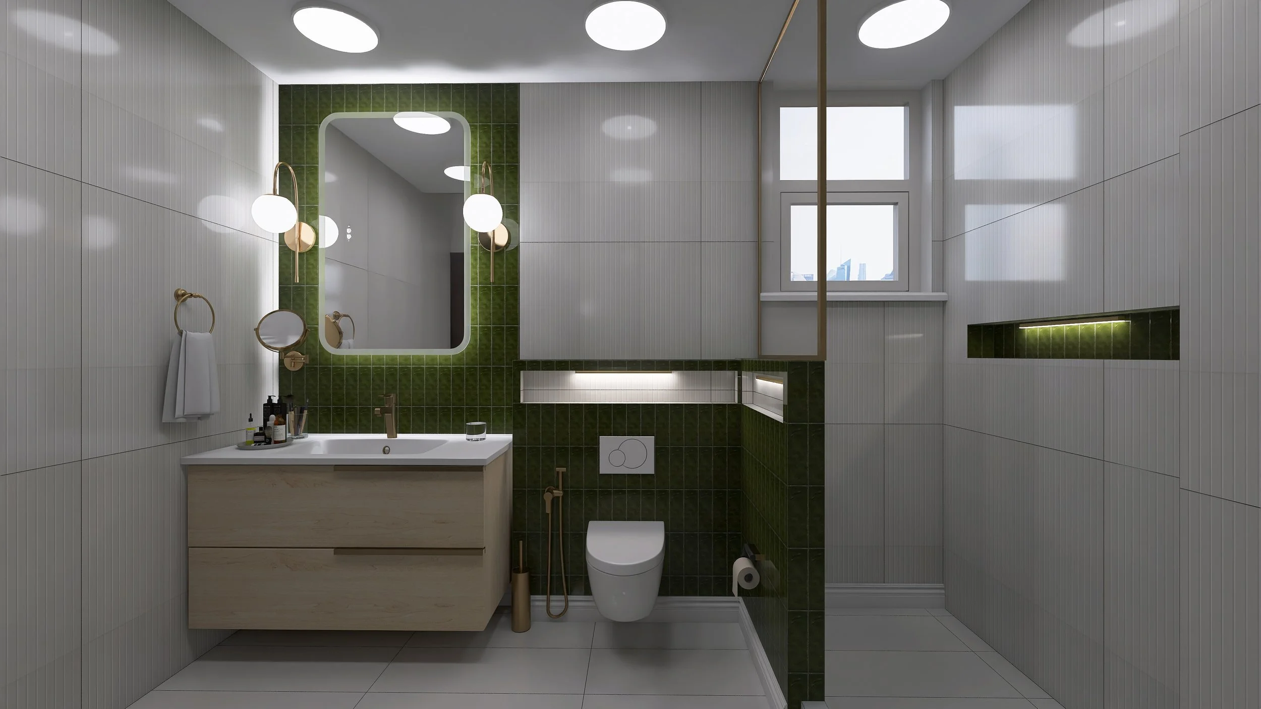 Modern bathroom with white tiled walls, green tiled accent wall behind mirror and toilet, wooden vanity with sink, large mirror, and circular wall sconces, small window, and a built-in shelf with lighting.