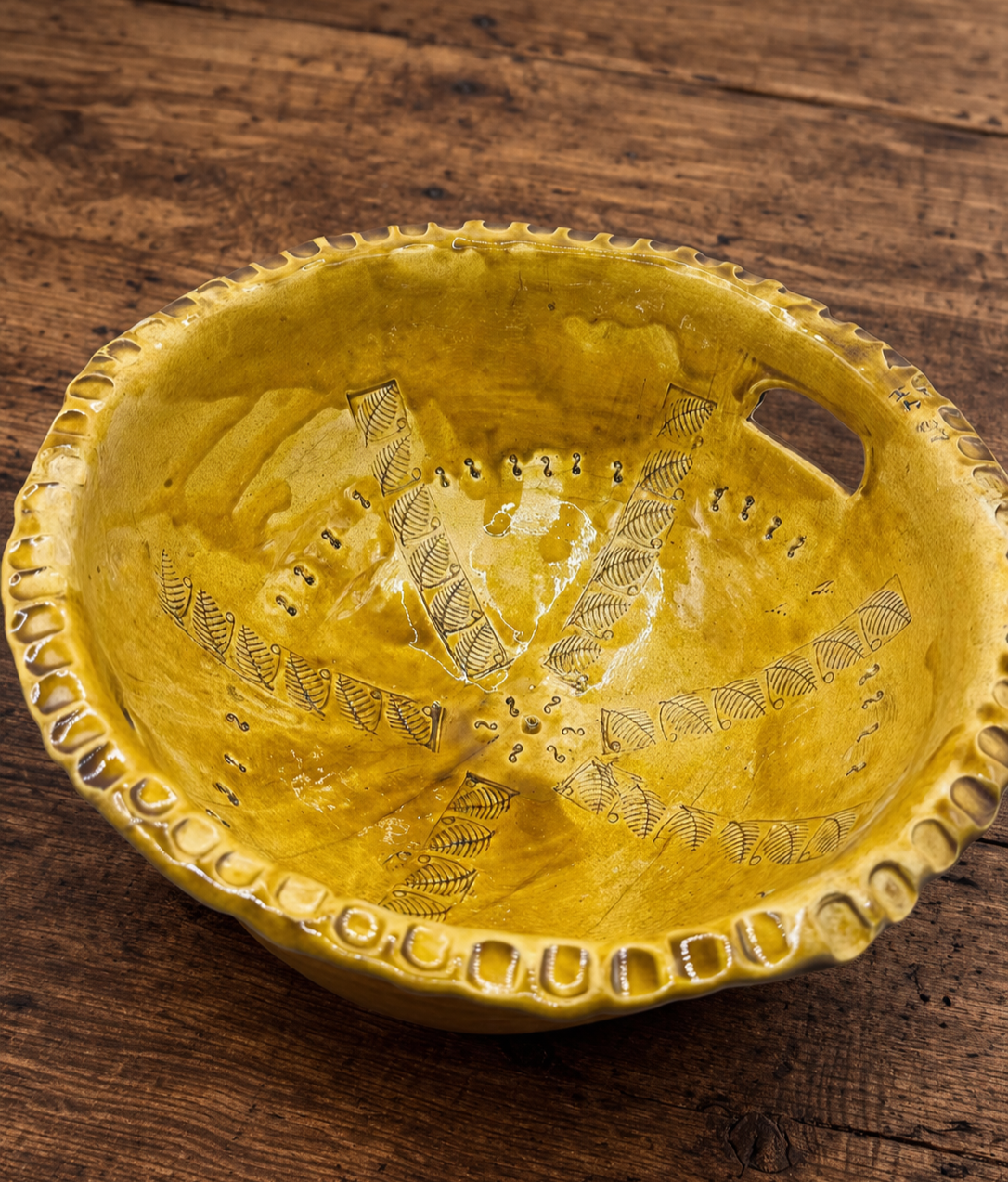 The-Unbound-Canvas-Blue-big-yellow-Ceramic-bowl-on-rustic-wood-table-1.png