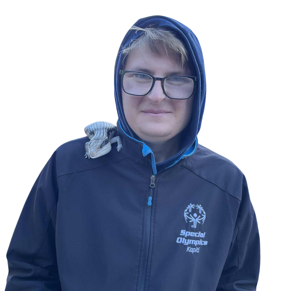Photograph of Louis in a blue hoodie with a special olymplics logo and a lizard on his shoulder