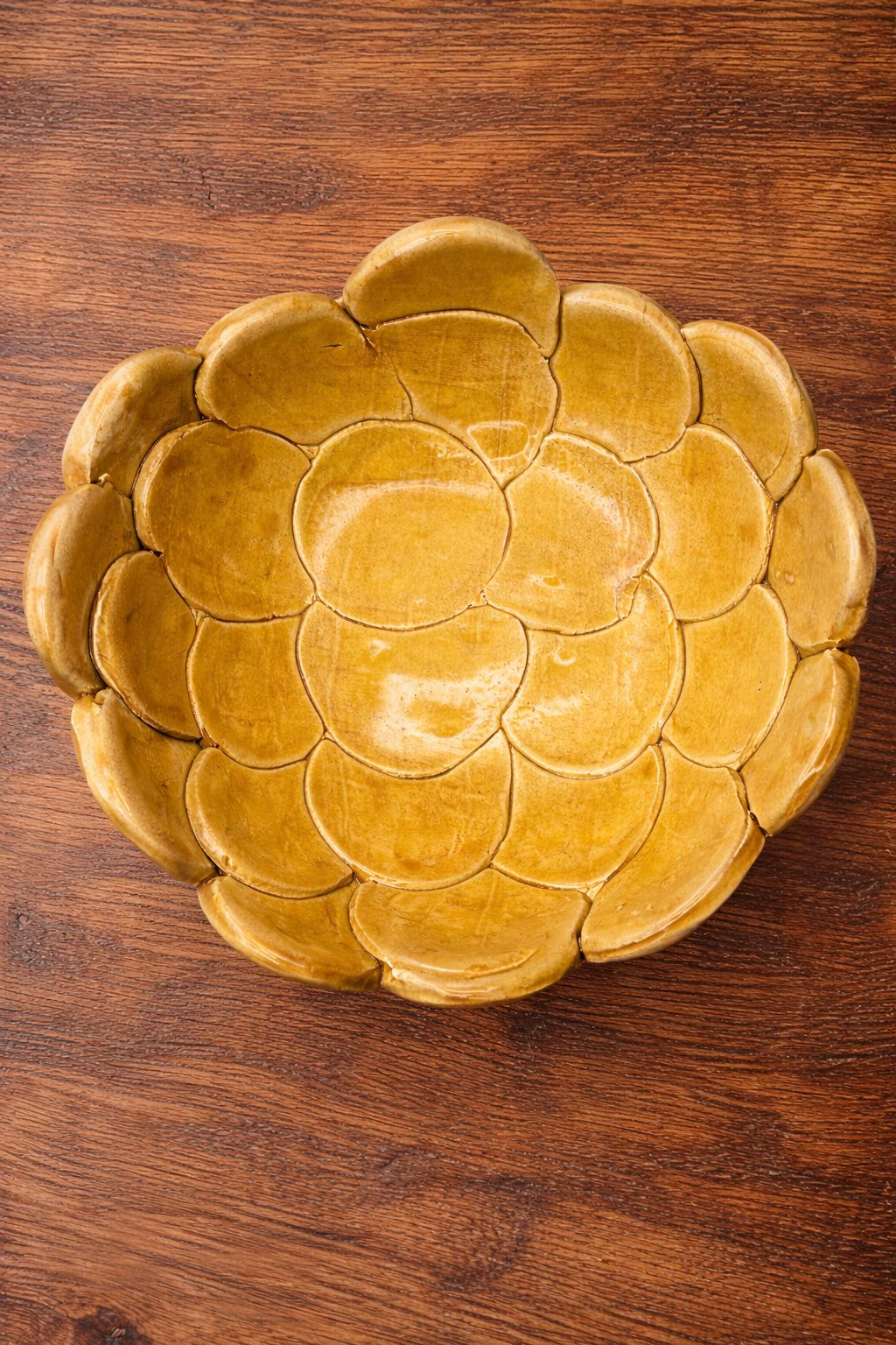 The-Unbound-Canvas-small-yellow-Ceramic-bowl-on-rustic-wood-table-1.png