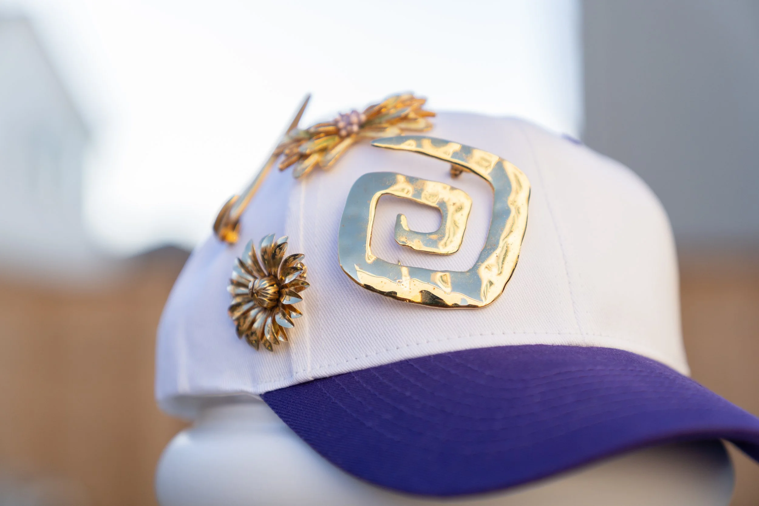PURPLE BILL DESIGNER GOLD-ACCENTED CAP
