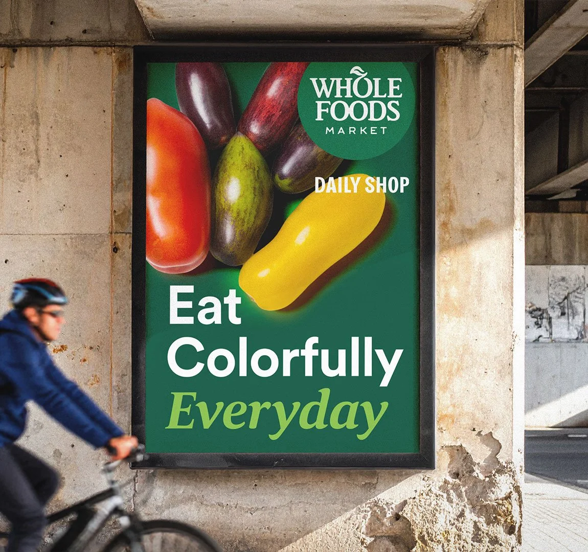 Werbeplakat mit bunten Gemüsesorten und dem Slogan 'Eat Colorfully Everyday'