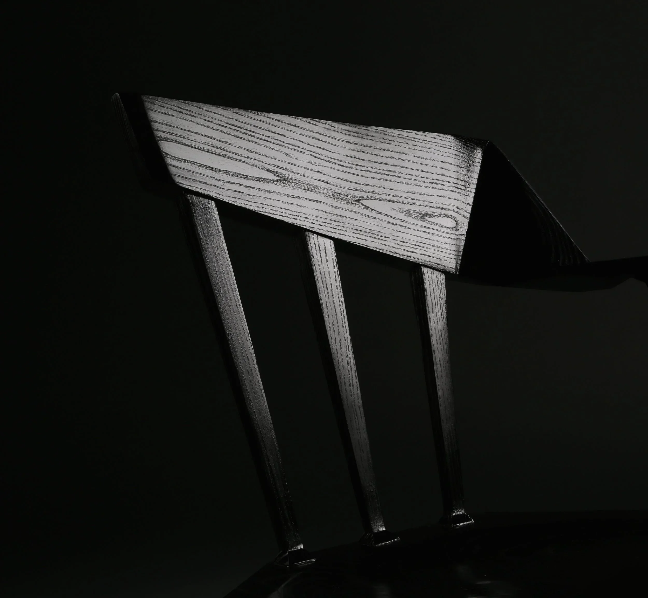 An angular black custom chair
