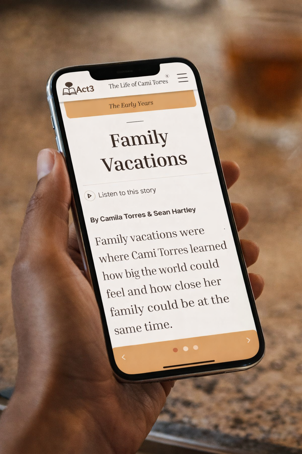 Smartphone screen displaying an e-book page titled 'Family Vacations' in a section called 'The Early Years,' with a subtitle 'Listen to this story' and author names Camila Torres and Sean Hartley. The text describes family vacations and how Cami Torres learned about the world and family closeness during these trips.