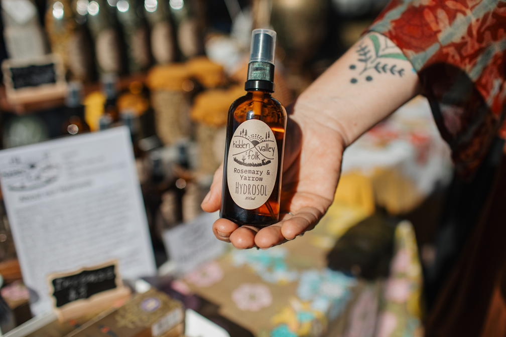 stalls-hand holding product.png