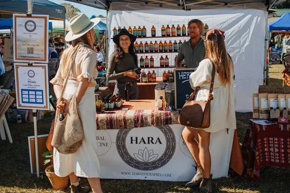 HerbFest - herbal stall - people chatting.jpg