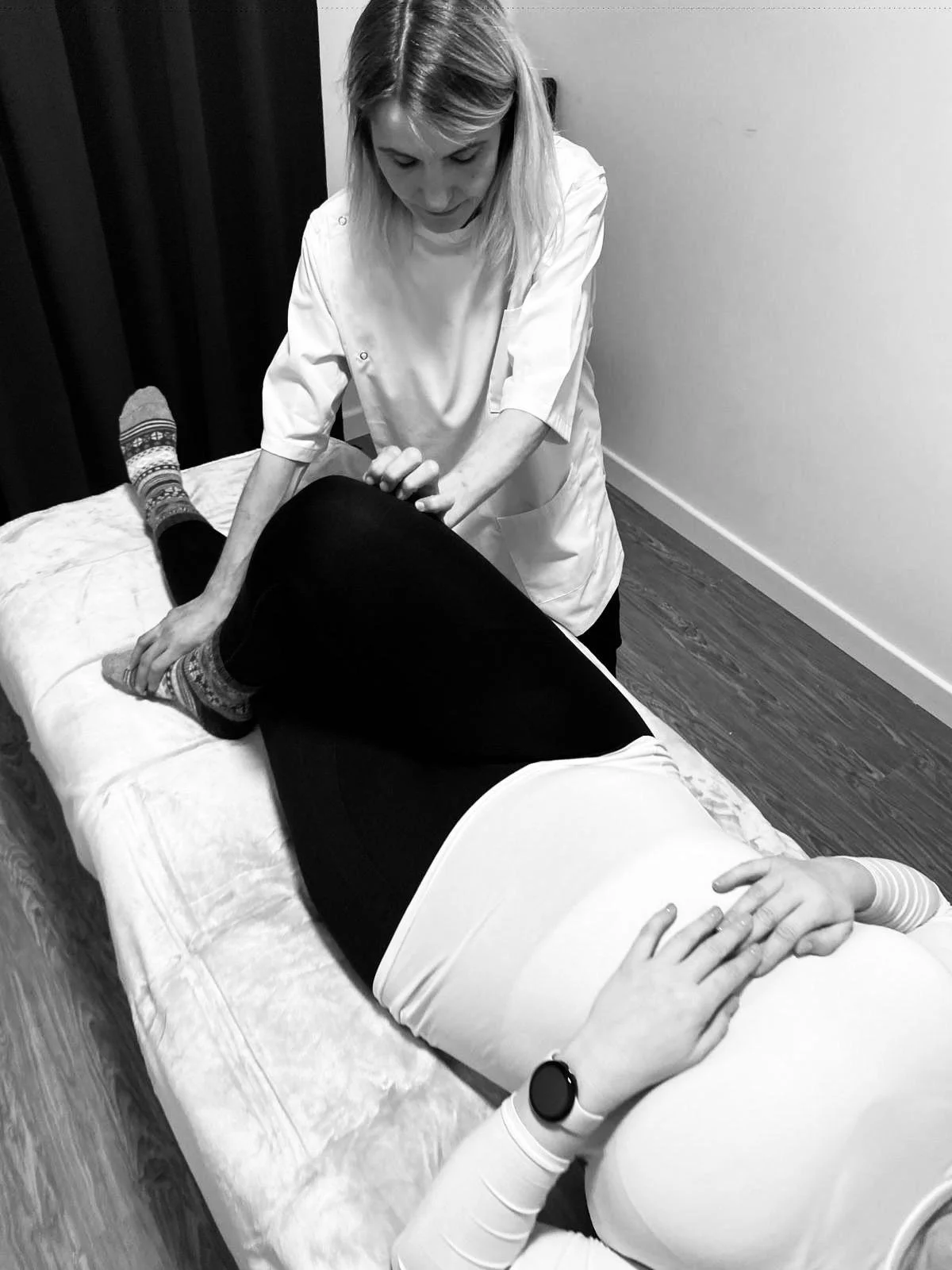 Eva gives a therapeutic massage to a client
