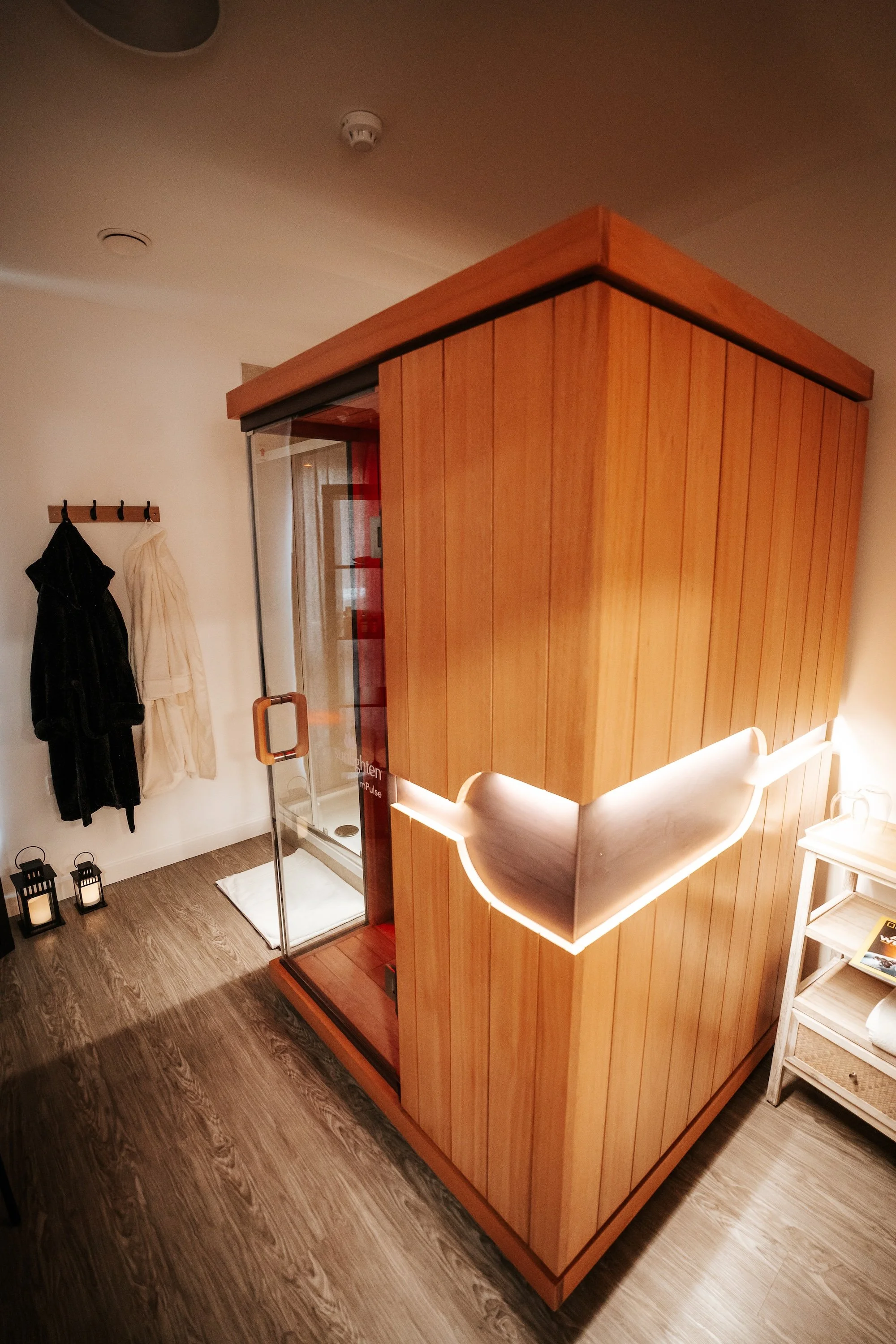 An infrared sauna in a dimly lit room