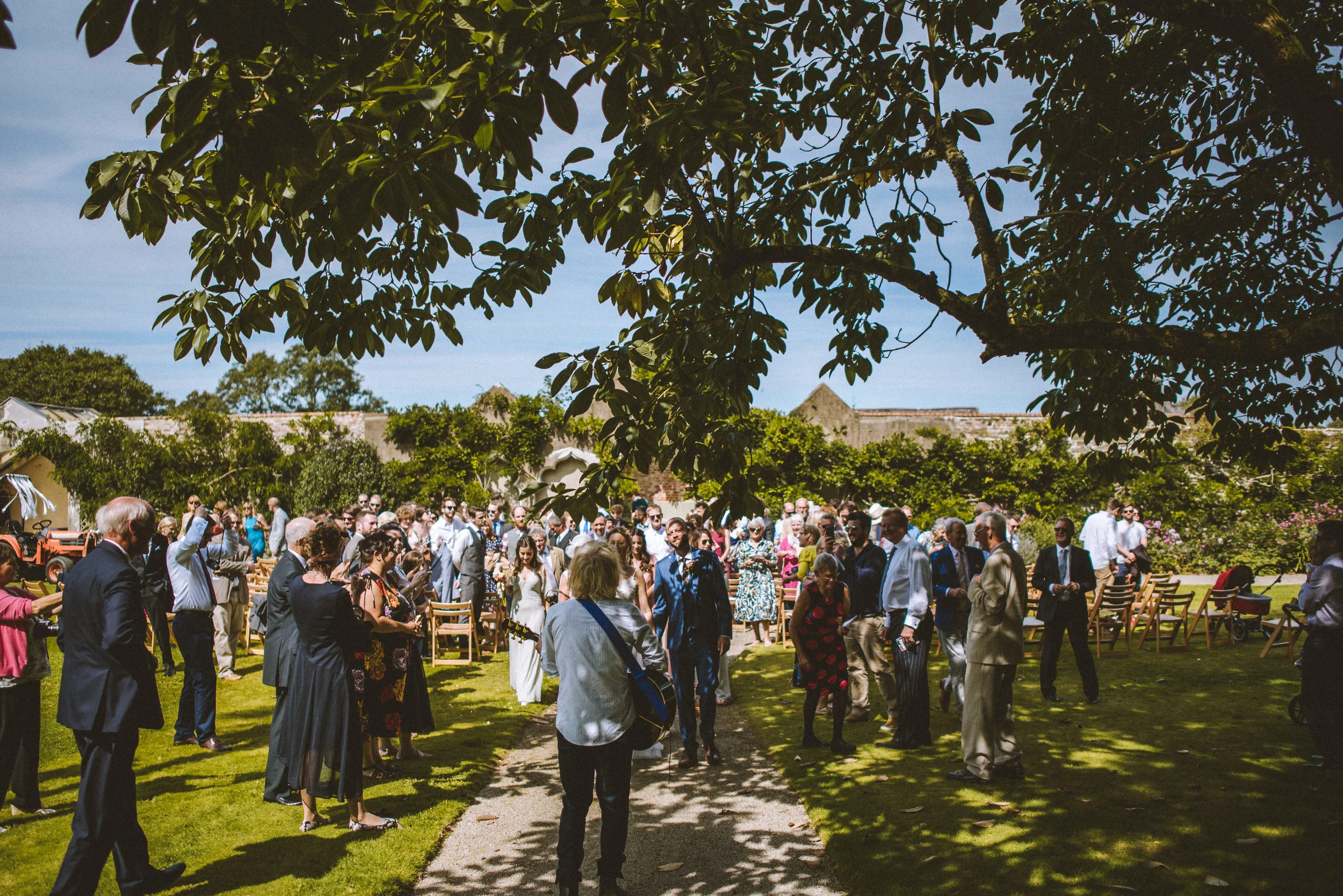 Outdoor ceremony at Pencarrow House captured by award-winning Cornwall wedding photographer Mark Shaw.
