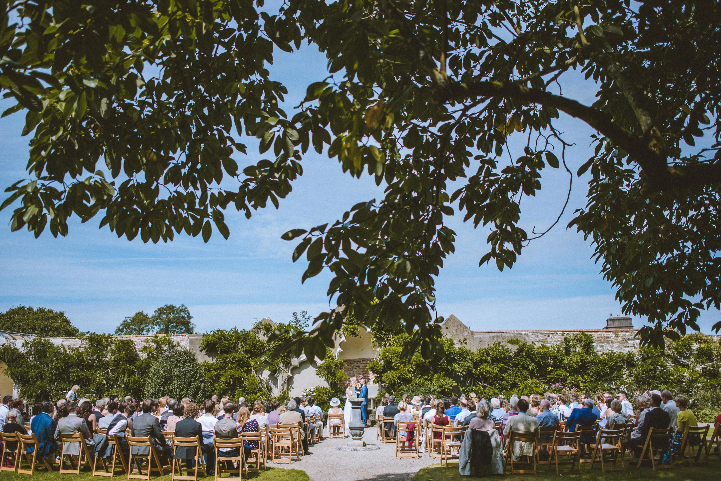 Outdoor ceremony at Pencarrow House captured by award-winning Cornwall wedding photographer Mark Shaw.
