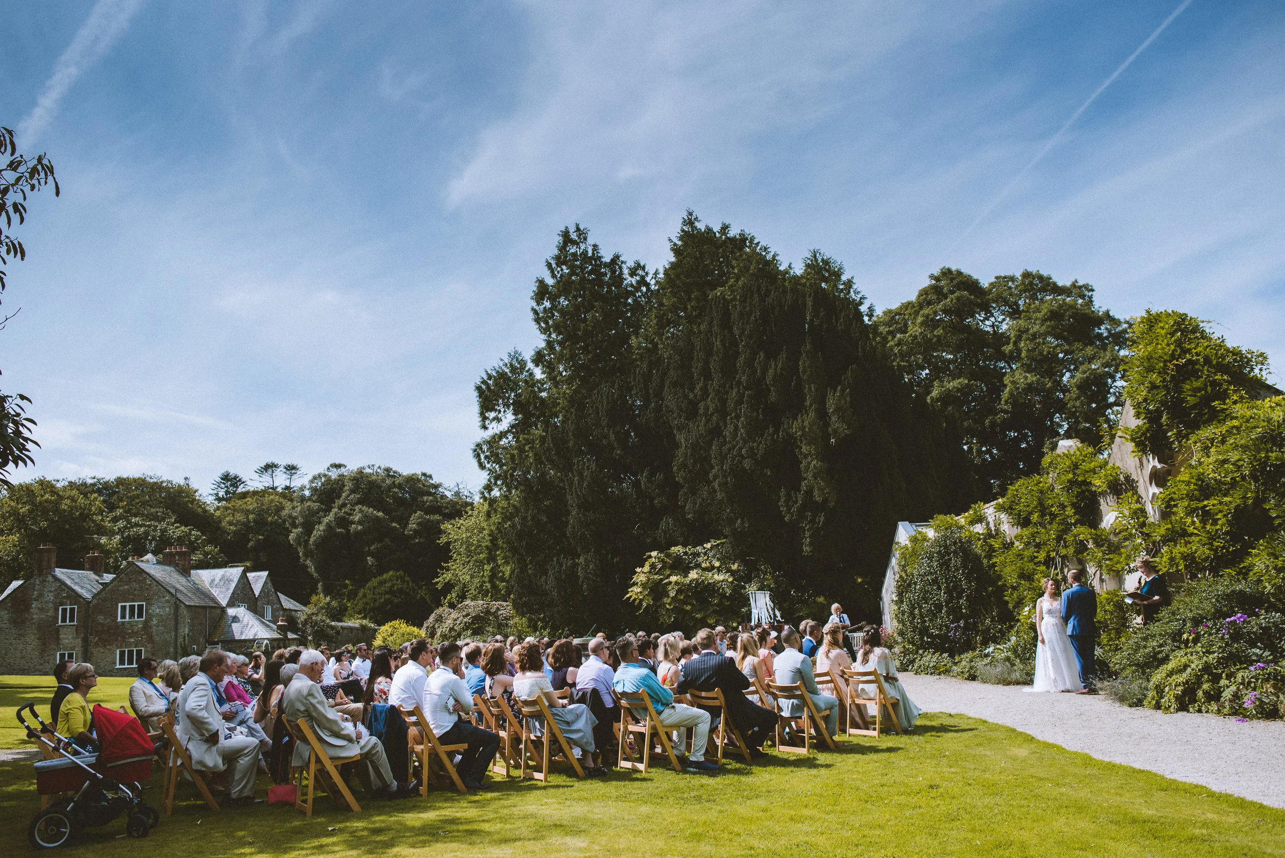 Outdoor ceremony at Pencarrow House captured by award-winning Cornwall wedding photographer Mark Shaw.
