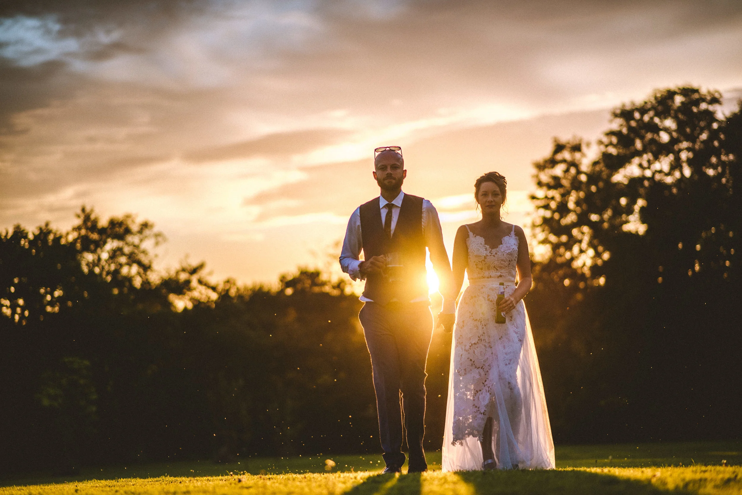 Bride and groom at Pencarrow House at sunset captured by award-winning Cornwall wedding photographer Mark Shaw