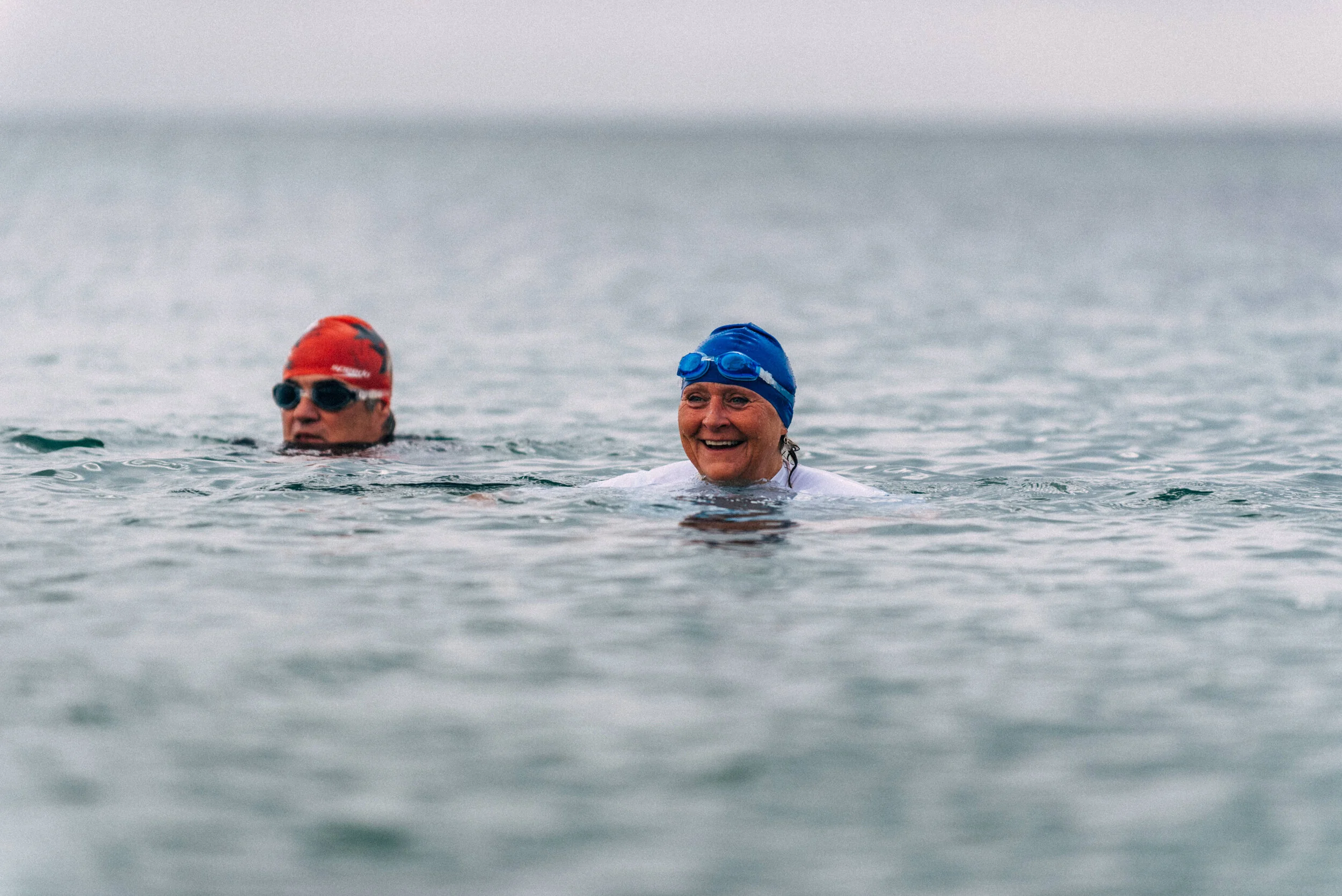 Swimmers in Falmouth for commercial lifestyle photography shoot for St Michael's Resort