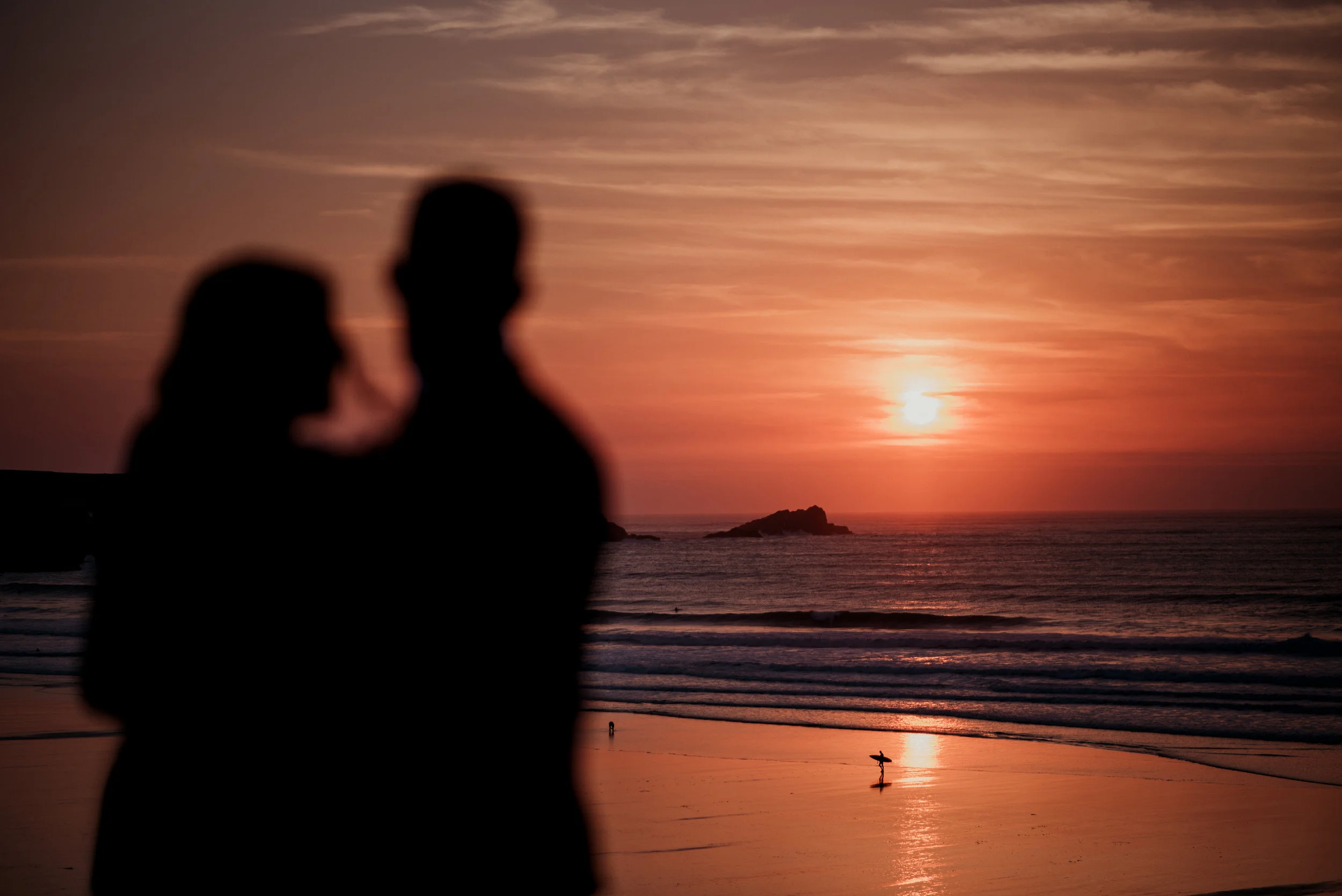Bride and groom at sunset in Newquay, Cornwall, captured by Cornwall wedding photographer Mark Shaw Photography
