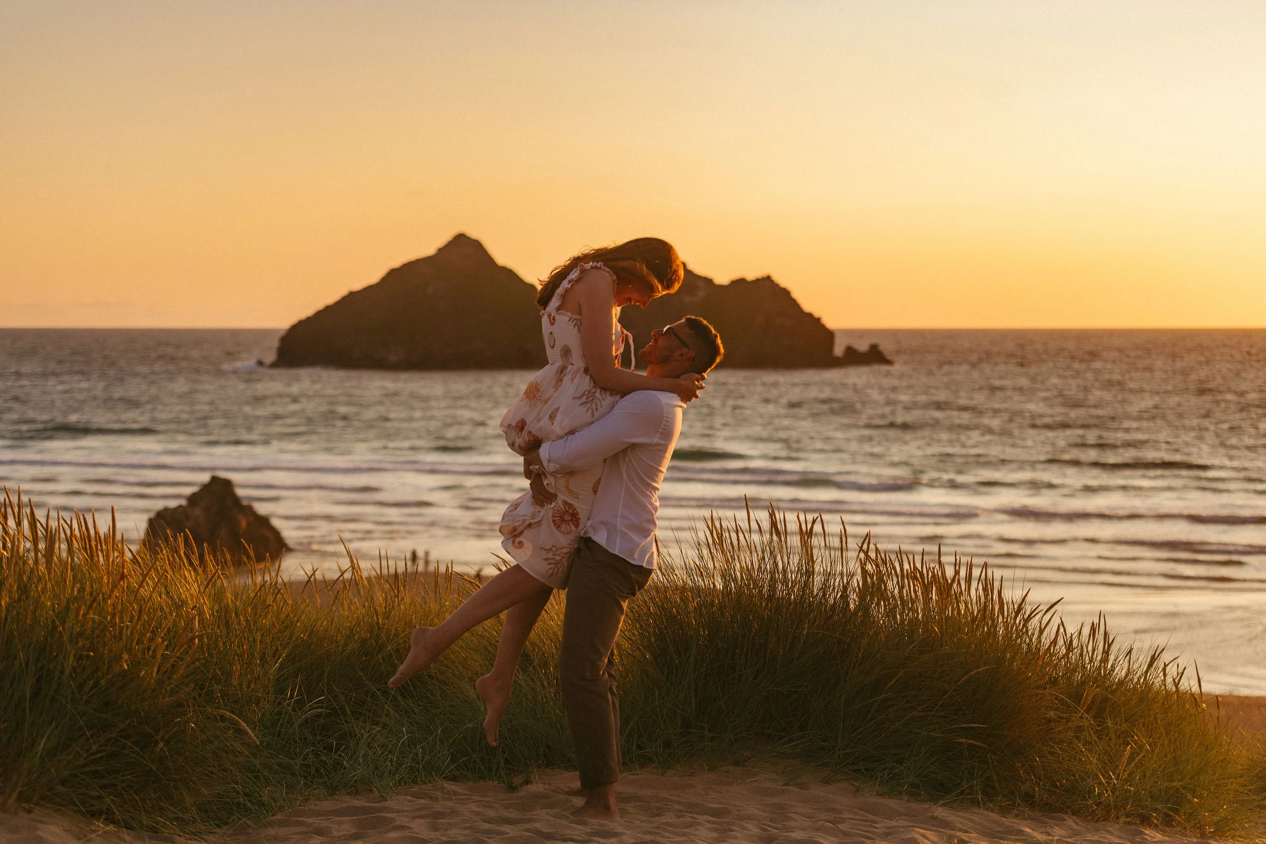 Mark-Shaw-Photography-holywell-bay-sunset-couple-1.jpg