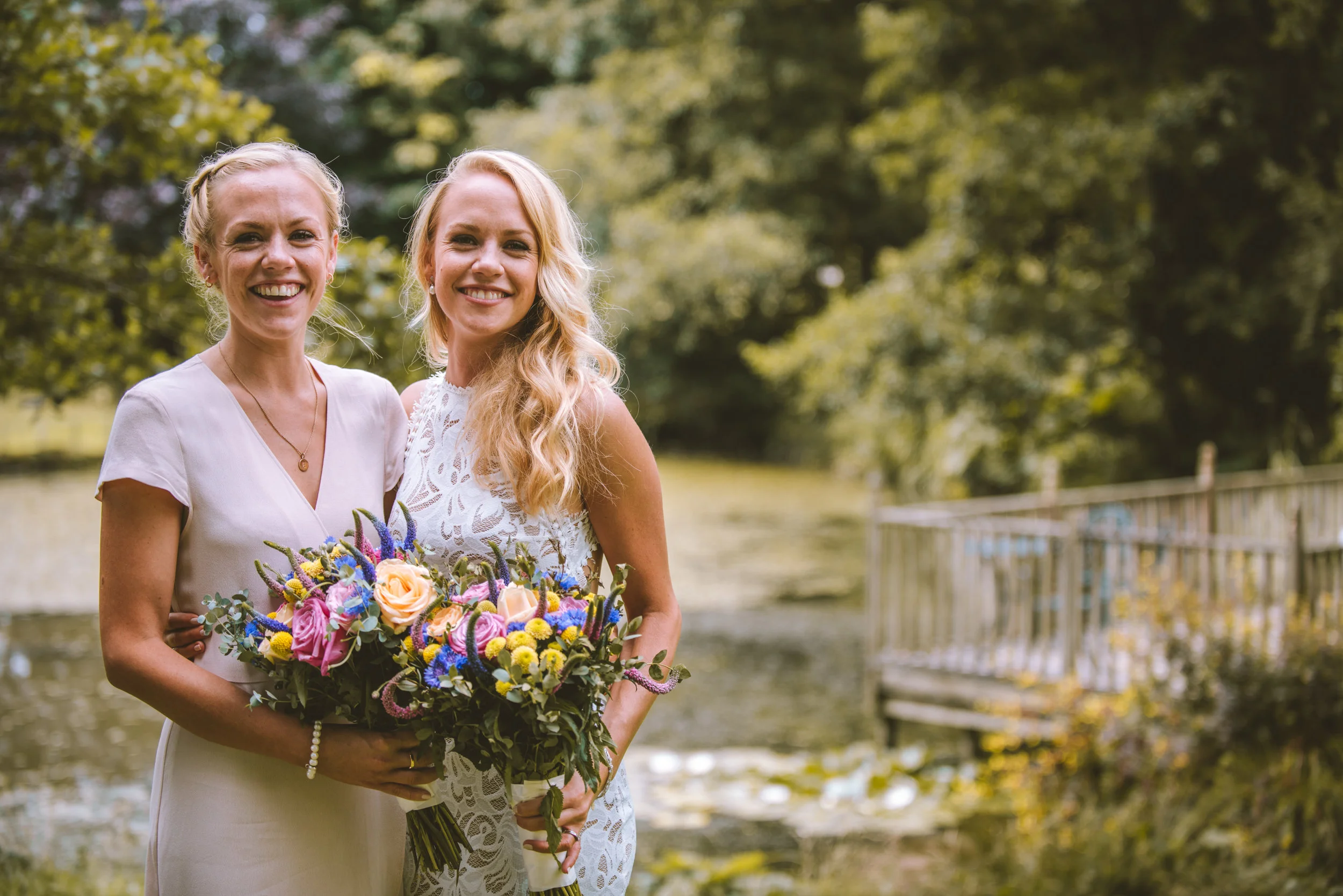 Bride and sister at Deer's Leap wedding venue in Devon by Mark Shaw Photography
