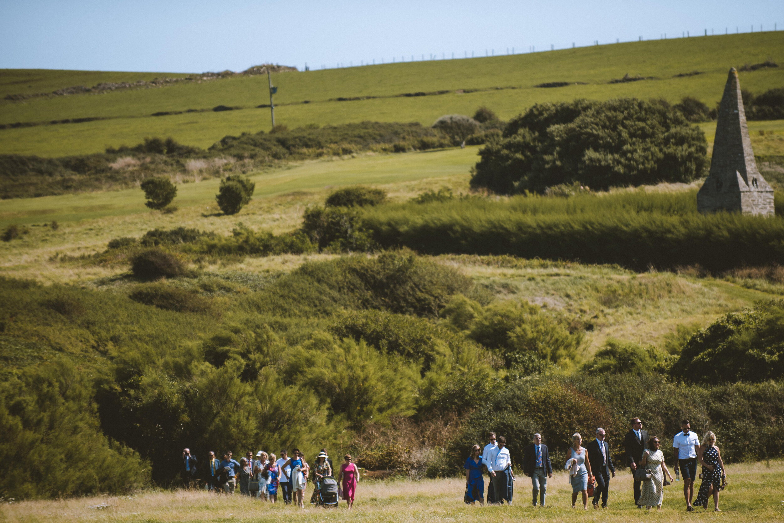Wedding photo at St Enodoc Church, Daymer Bay in Cornwall. 