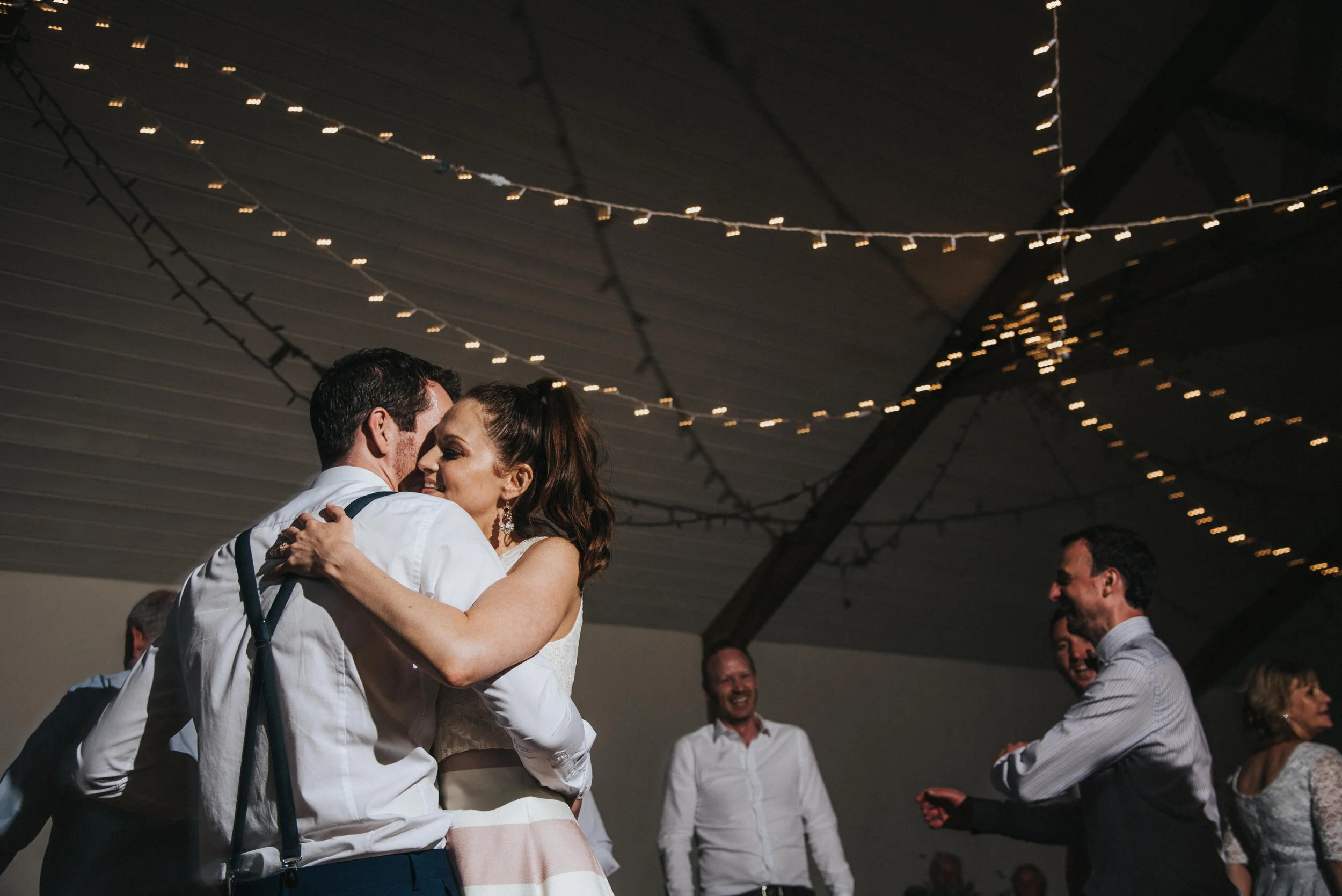 Evening wedding party at Launcells Barton in Bude, captured by Cornwall wedding photographer Mark Shaw Photography