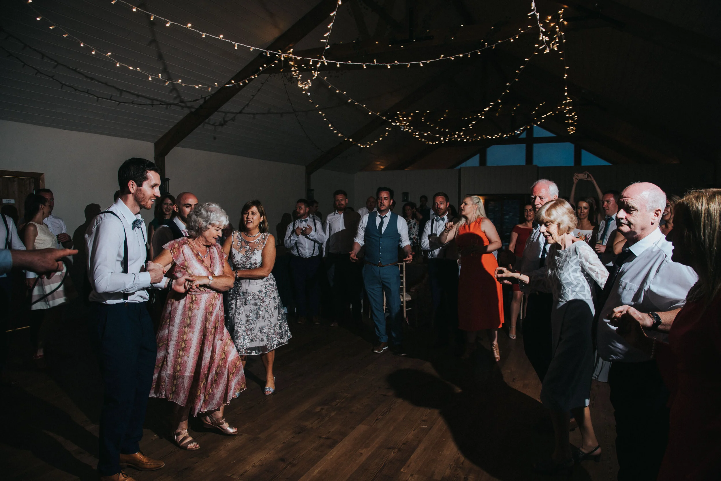 Wedding party at Launcells Barton in Bude, captured by Cornwall wedding photographer Mark Shaw Photography