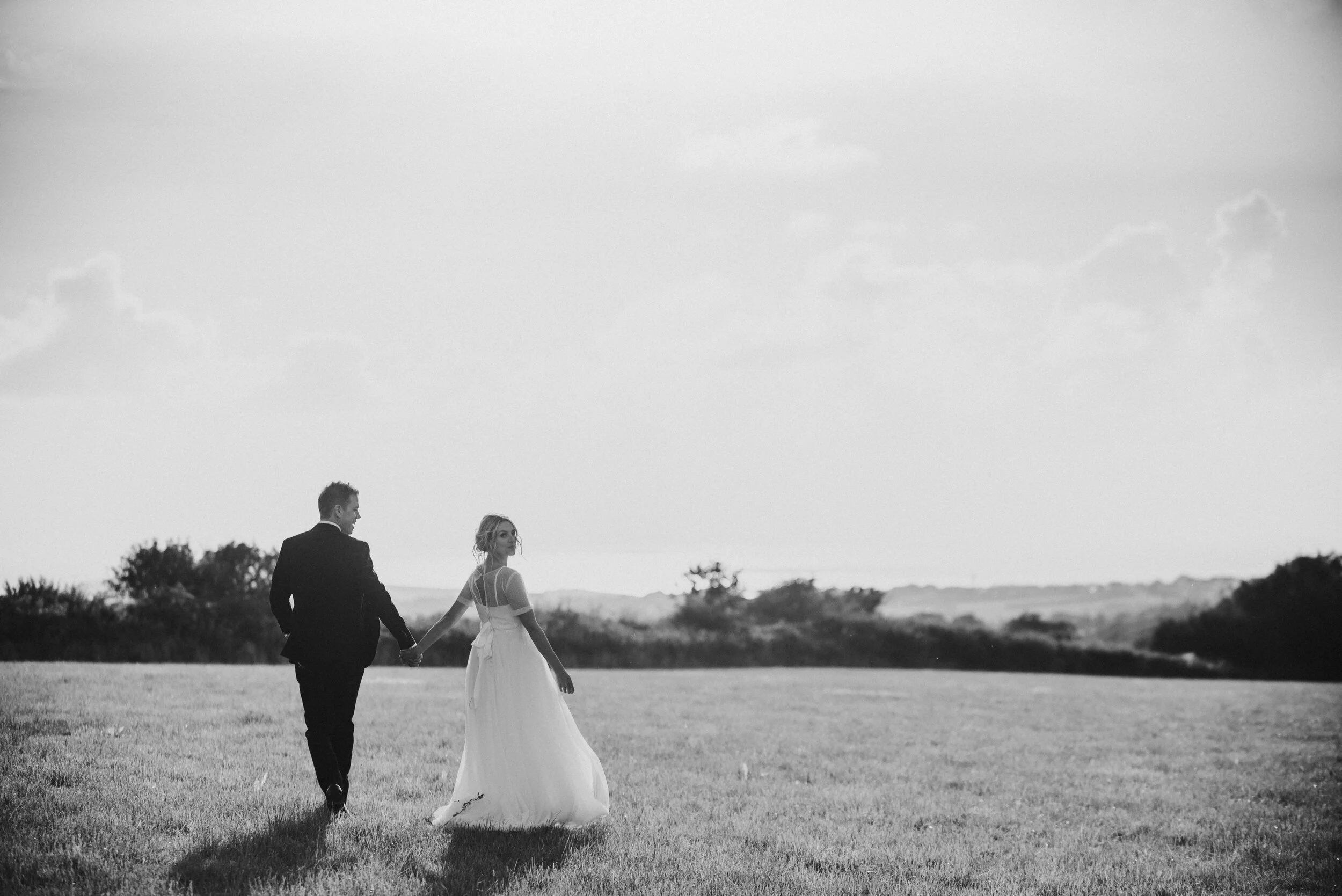 Bride and groom at Launcells Barton in Bude, captured by Cornwall wedding photographer Mark Shaw Photography