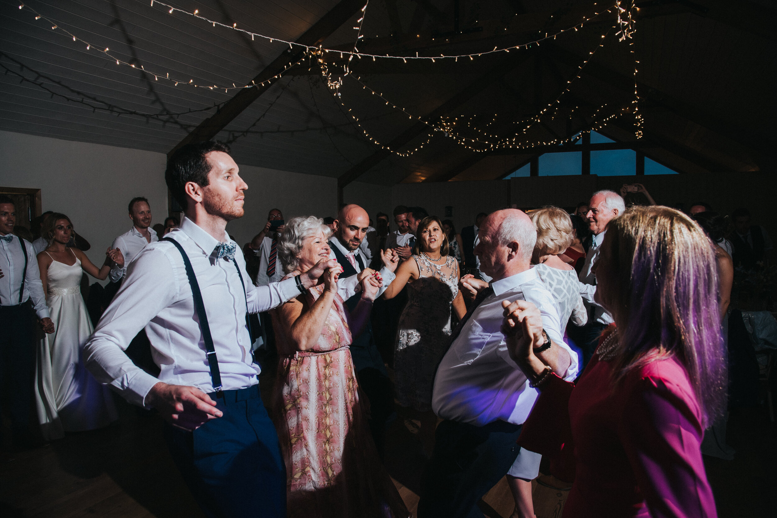 Evening wedding party in Cornwall captured award-winning wedding photographer Mark Shaw Photography