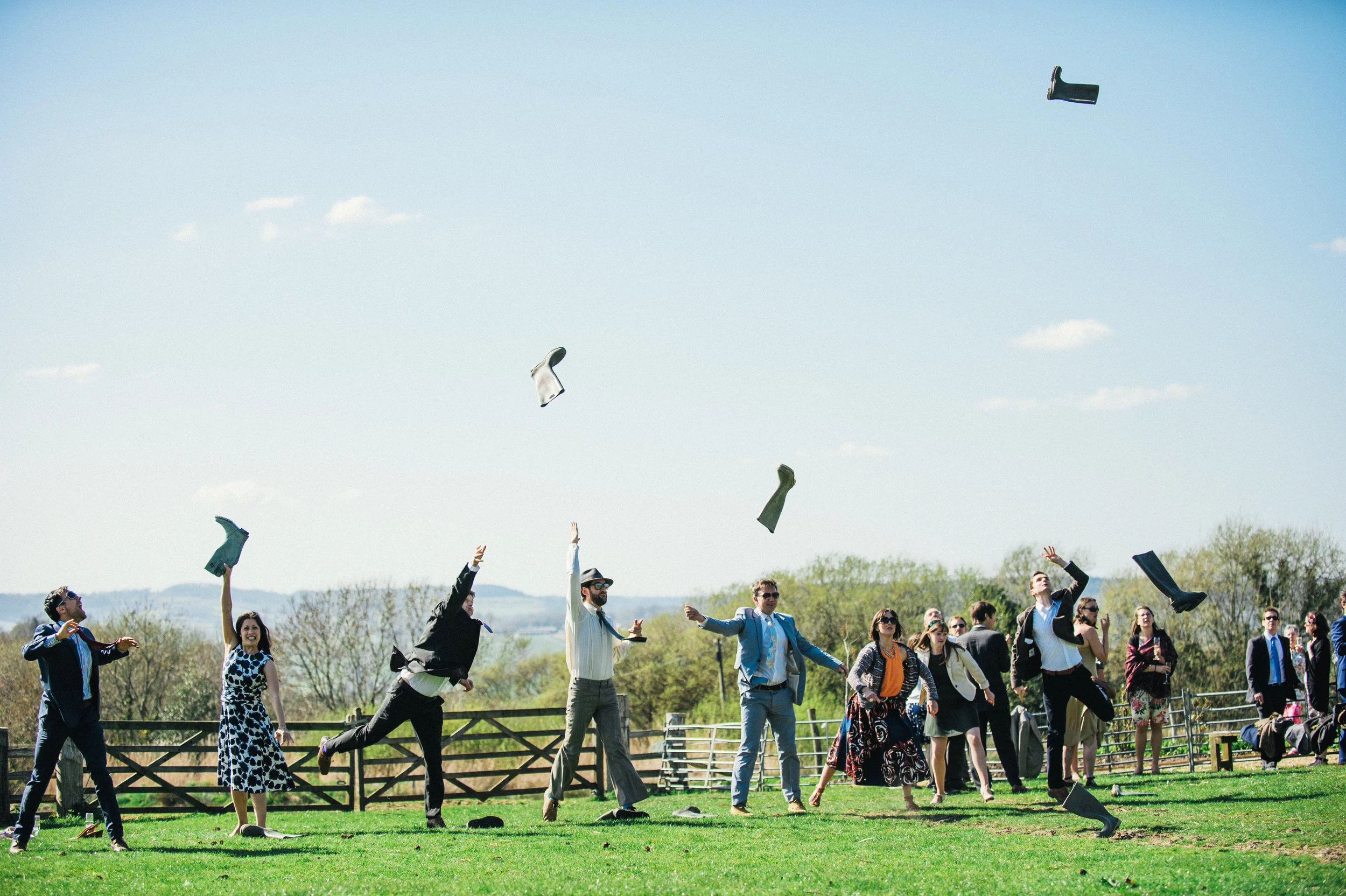 Wedding games captured by Cornwall wedding photographer Mark Shaw Photography - welly wanging