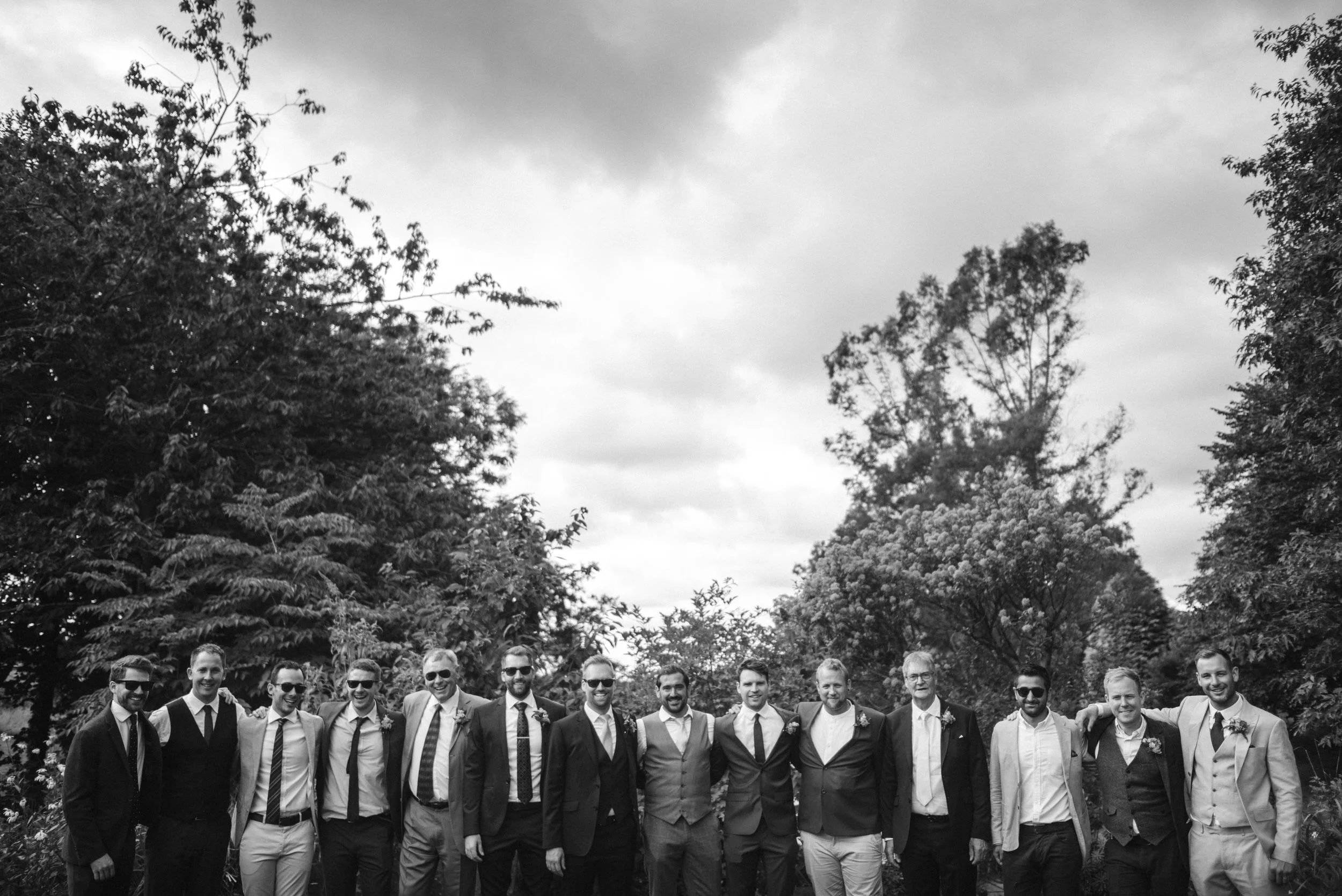 Group photo of guys from wedding captured at Deers leap in Devon