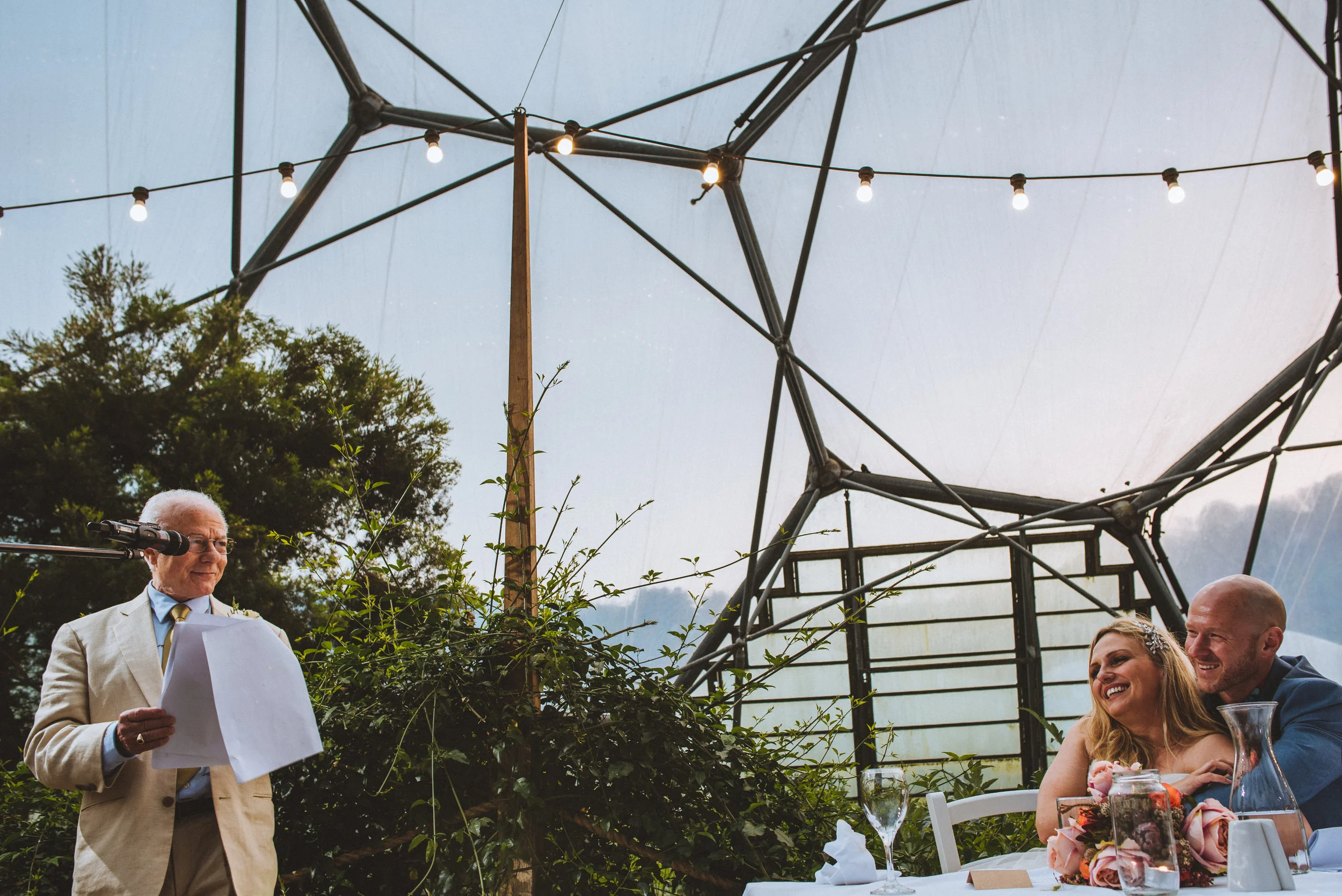 Wedding at the eden project in Cornwall with father of the groom giving a funny speech, captured by award-winning Cornwall wedding photographer, Mark Shaw. 