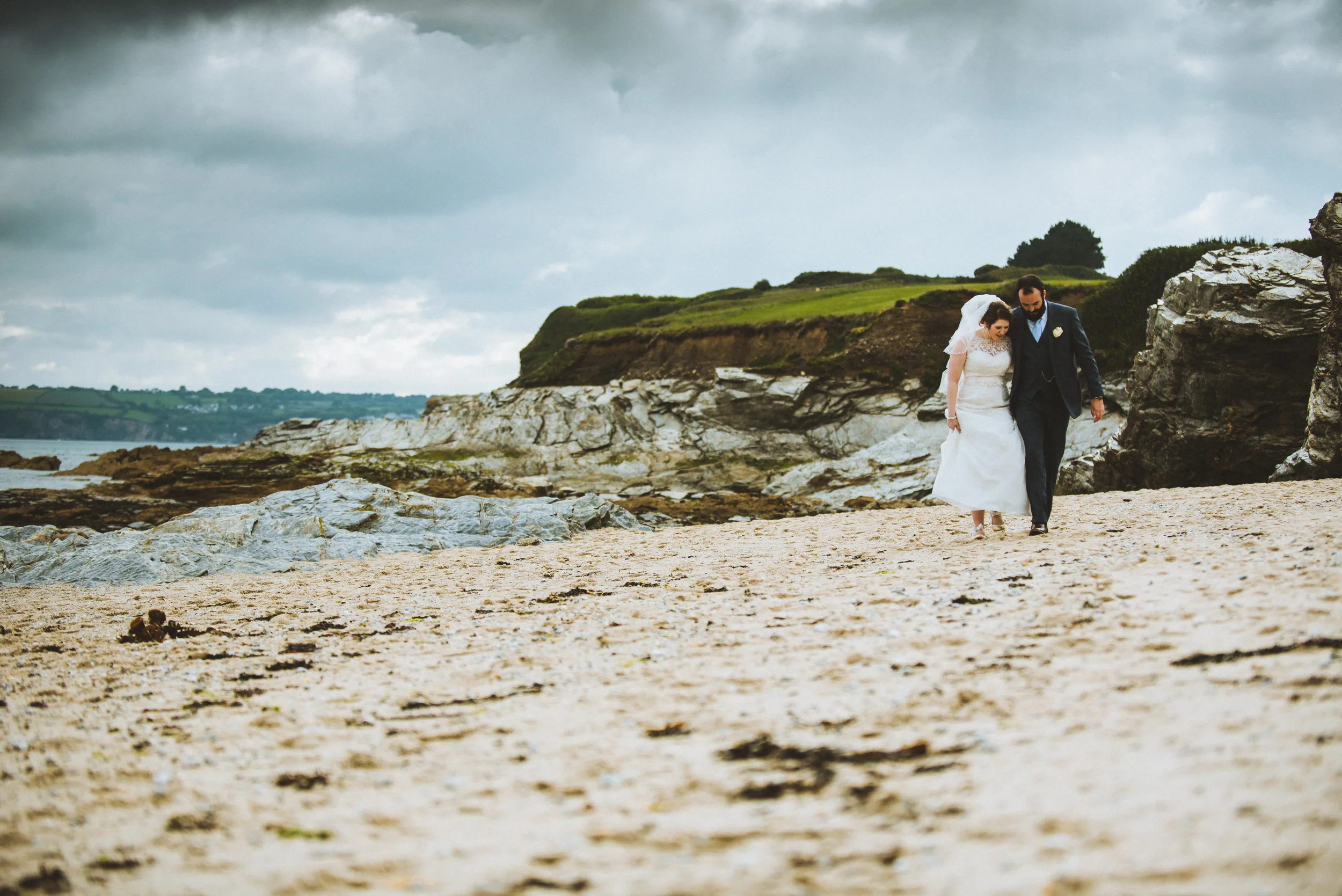 wedding couple on beach captured by Cornwall wedding photographer Mark Shaw Photography