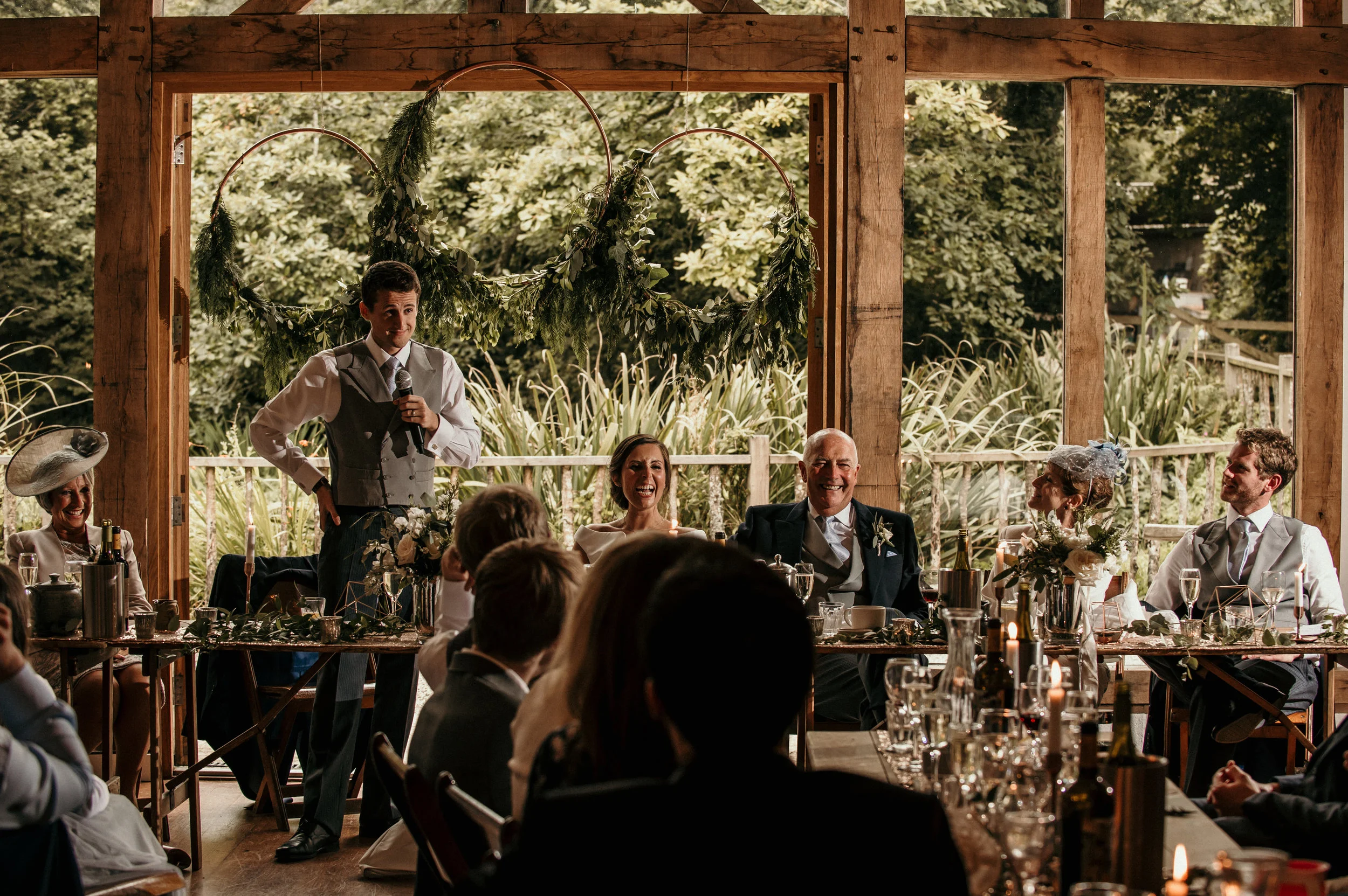 Wedding speeches captured at Nancarrow Farm by award-winning documentary style Cornwall wedding photographer Mark Shaw Photography.