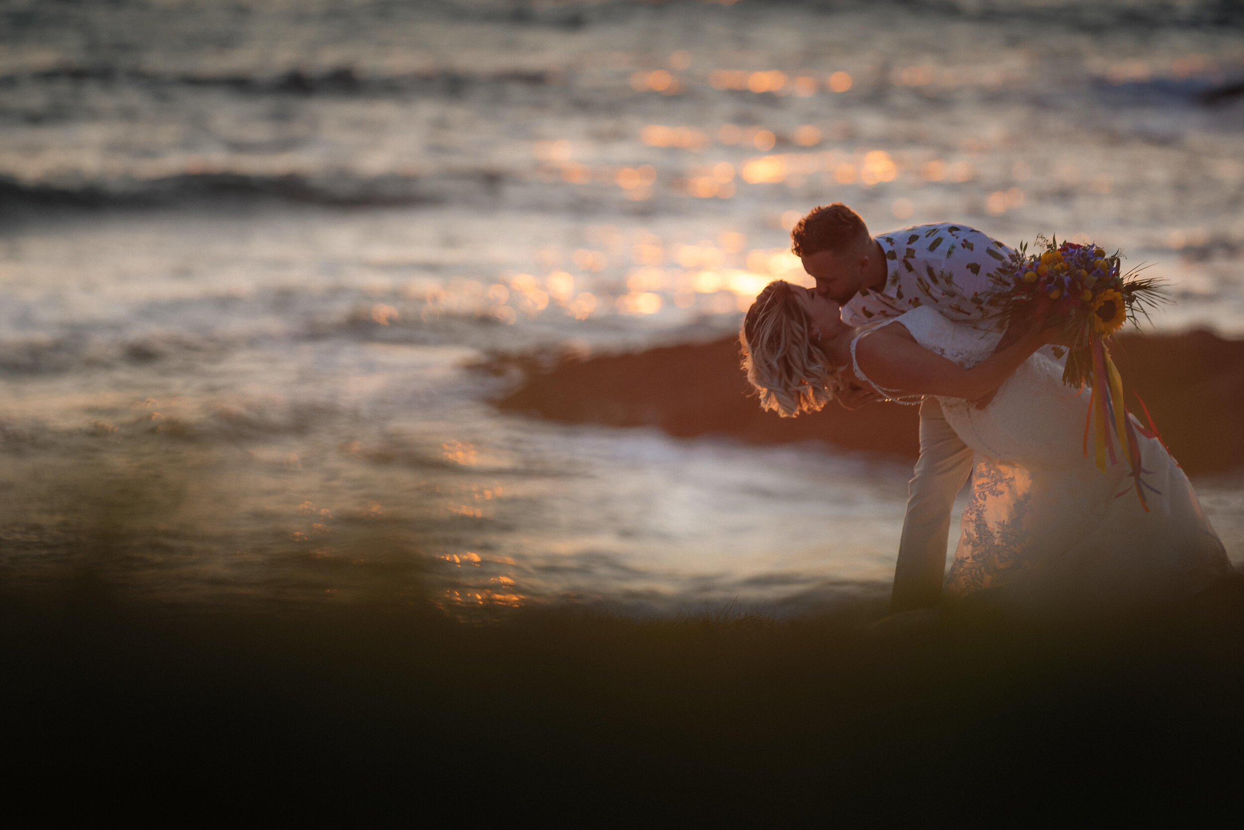 Bride and groom at Headland in Newquay by Cornwall wedding photographer Mark Shaw Photography 