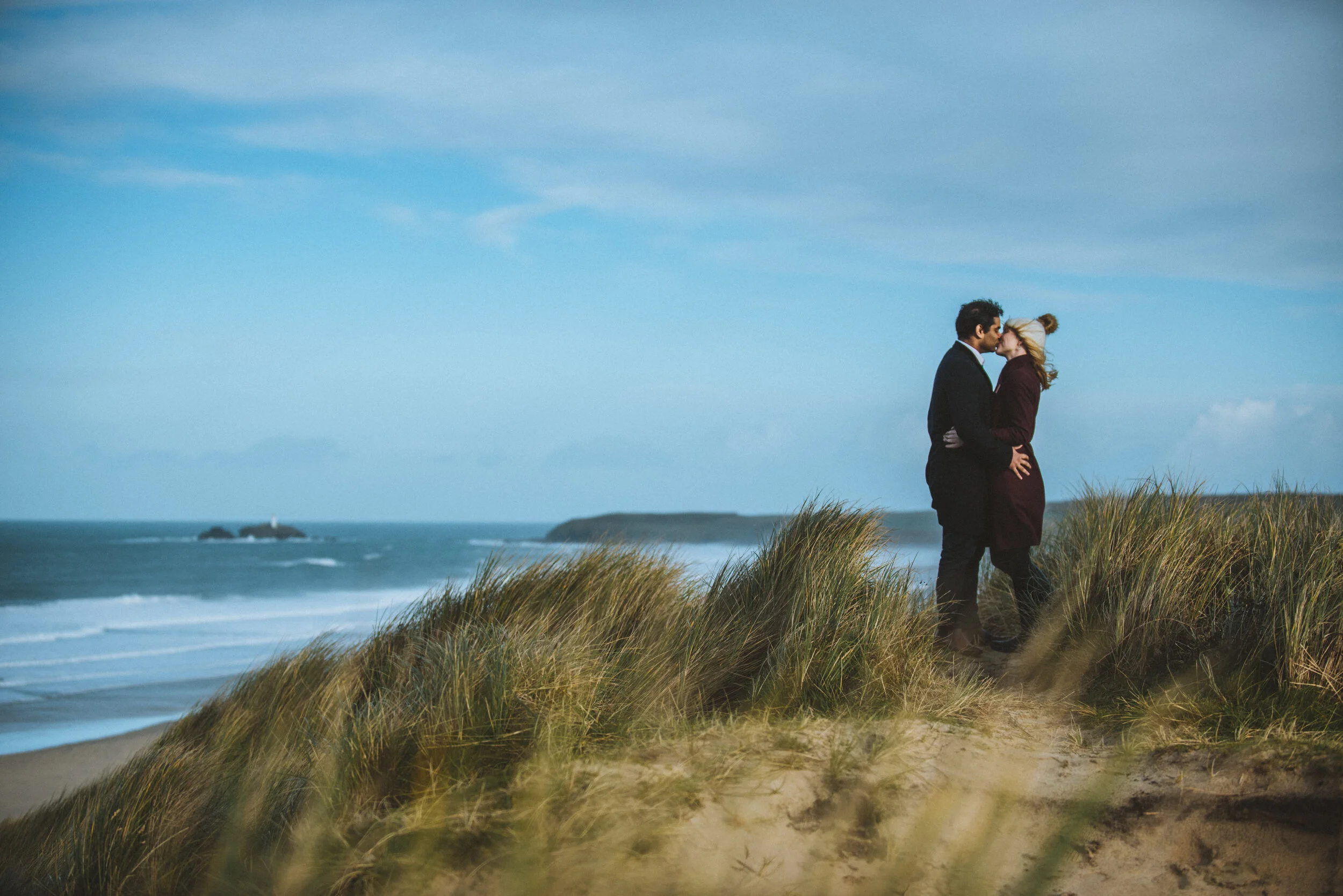 Pre wedding shoot with couple at Gwithian, captured by Cornwall wedding photographer Mark Shaw Photography
