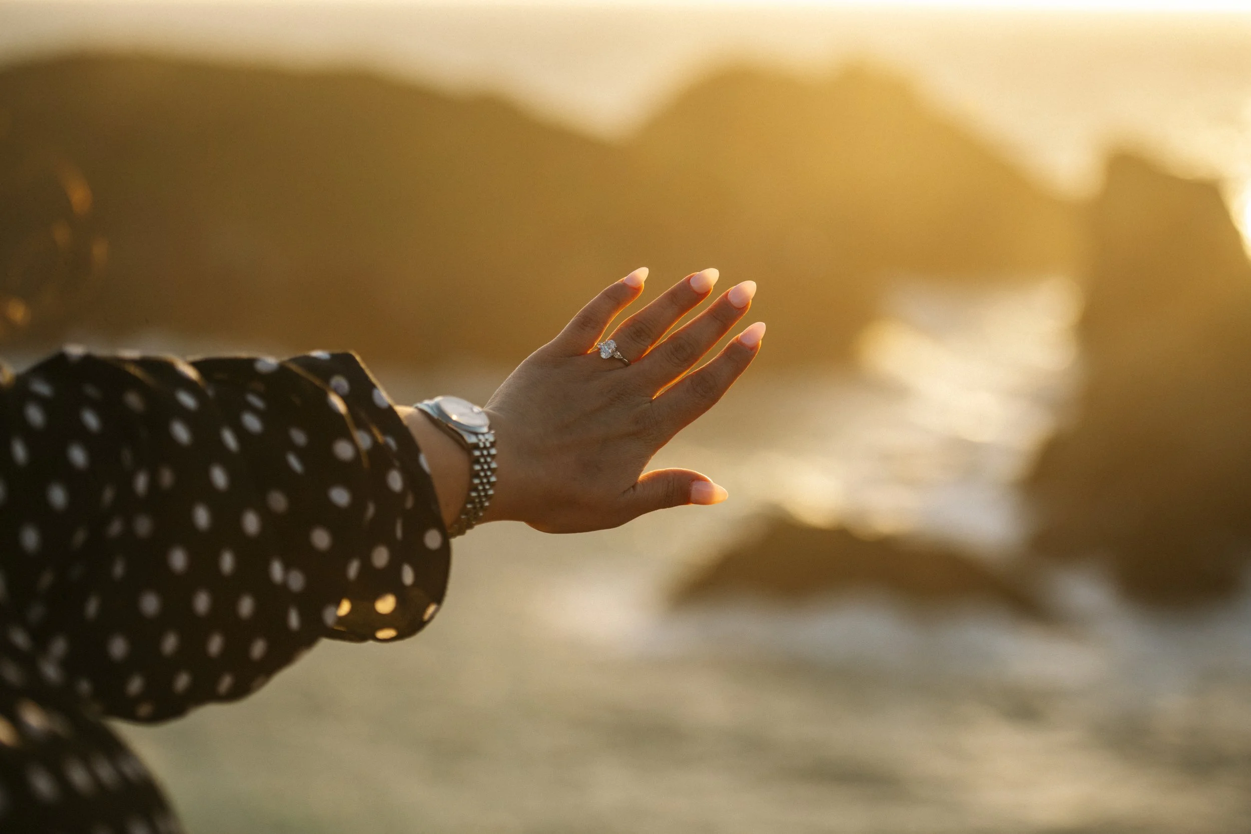 Surprise engagement proposal at Kynance Cove in Cornwall