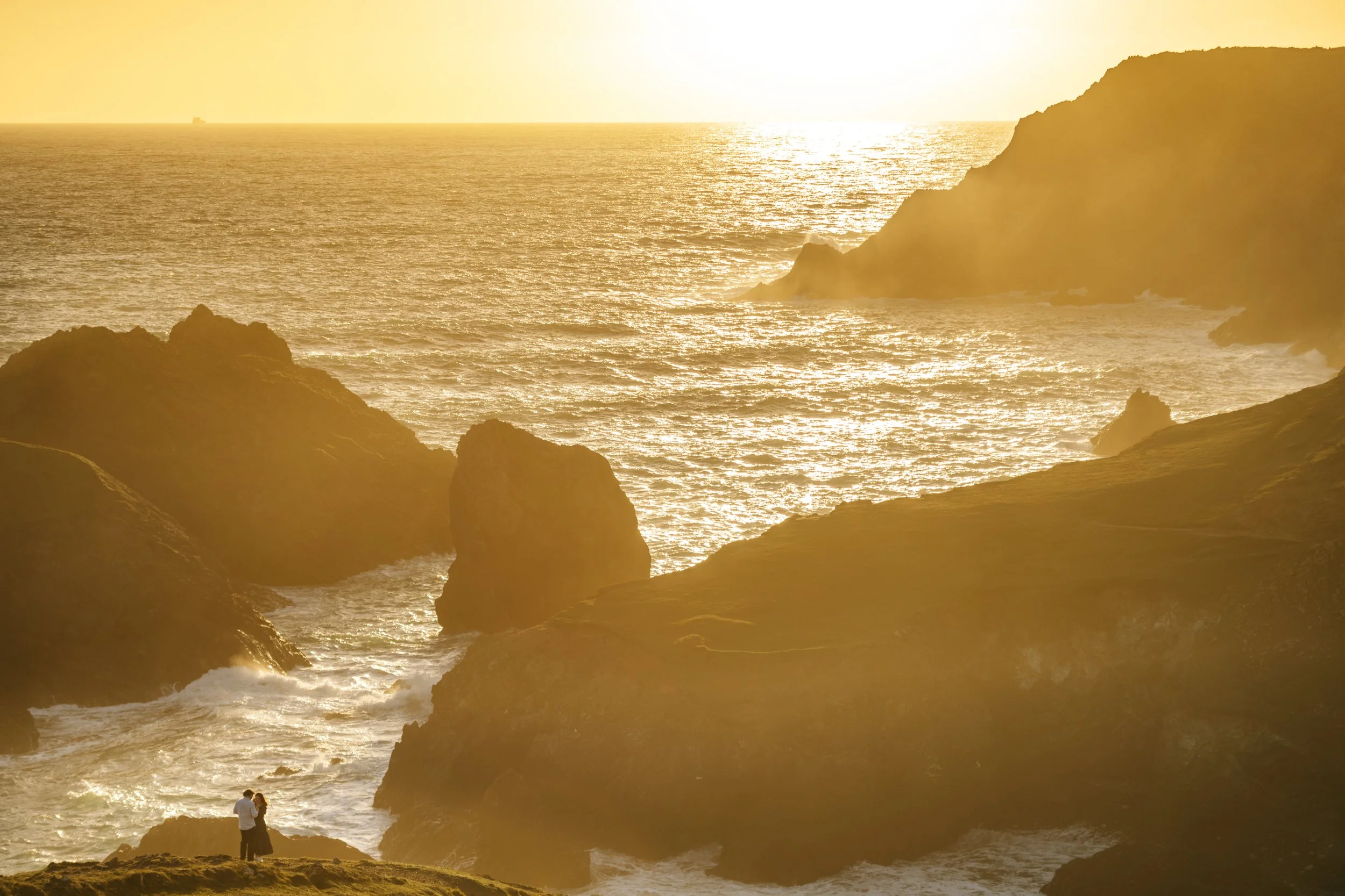 Surprise engagement proposal at Kynance Cove in Cornwall