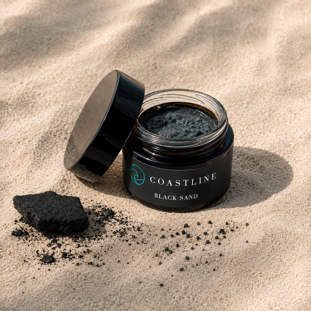 coastline-clear-black-sand-exfoliant-open.png