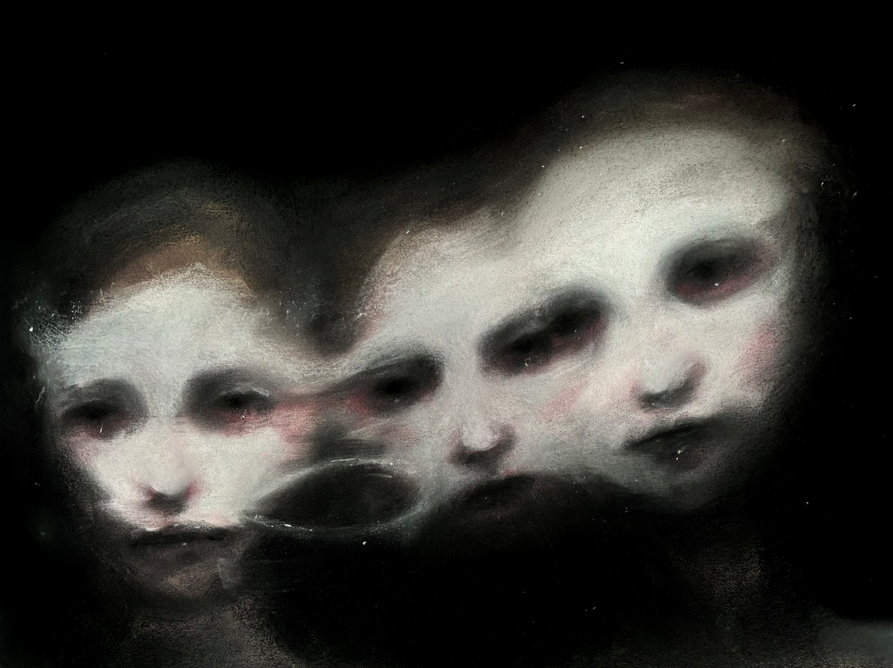 Three ghostly faces with pale skin, dark eyes, and subtle makeup, emerging from a dark background in a surreal, haunting scene.