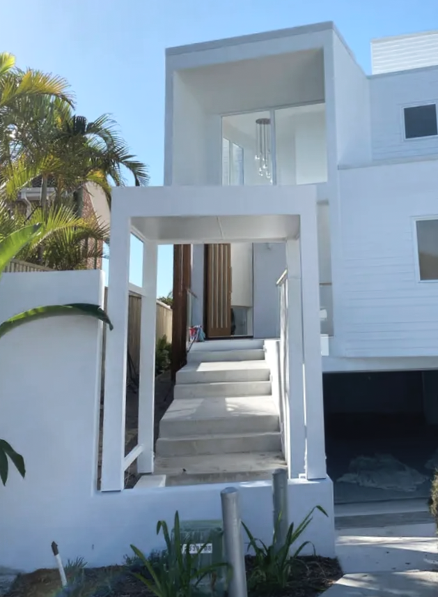 Exterior house painting for a luxury modern home in Queensland, featuring premium weatherproof coatings and detailed surface preparation. Designed for durability, curb appeal, and long-lasting protection in Australian coastal conditions.